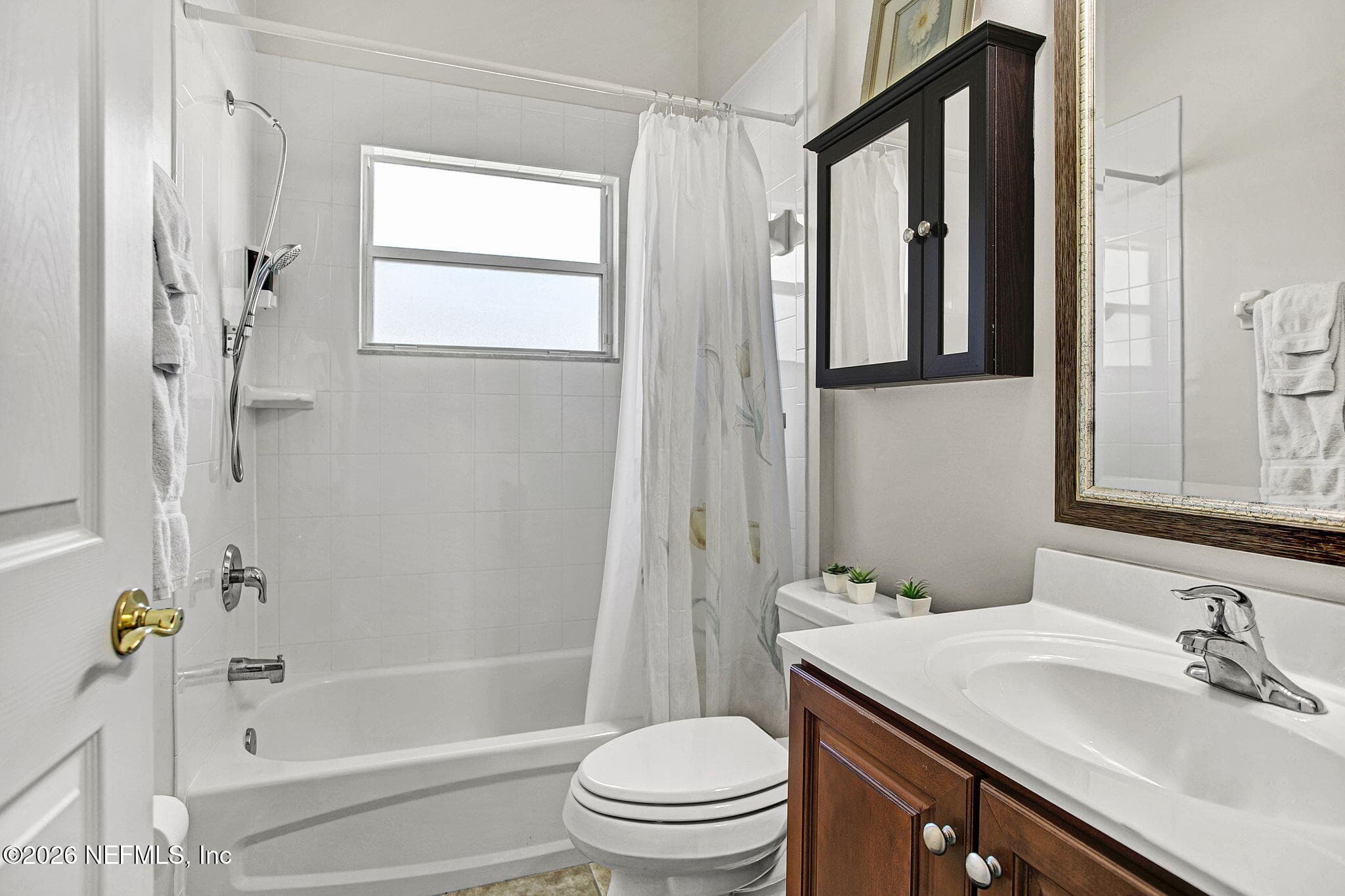 Bathroom #2 off the kitchen near bedroom #2 — 3576 BARTON CREEK Circle, Green Cove Springs, FL 32043
