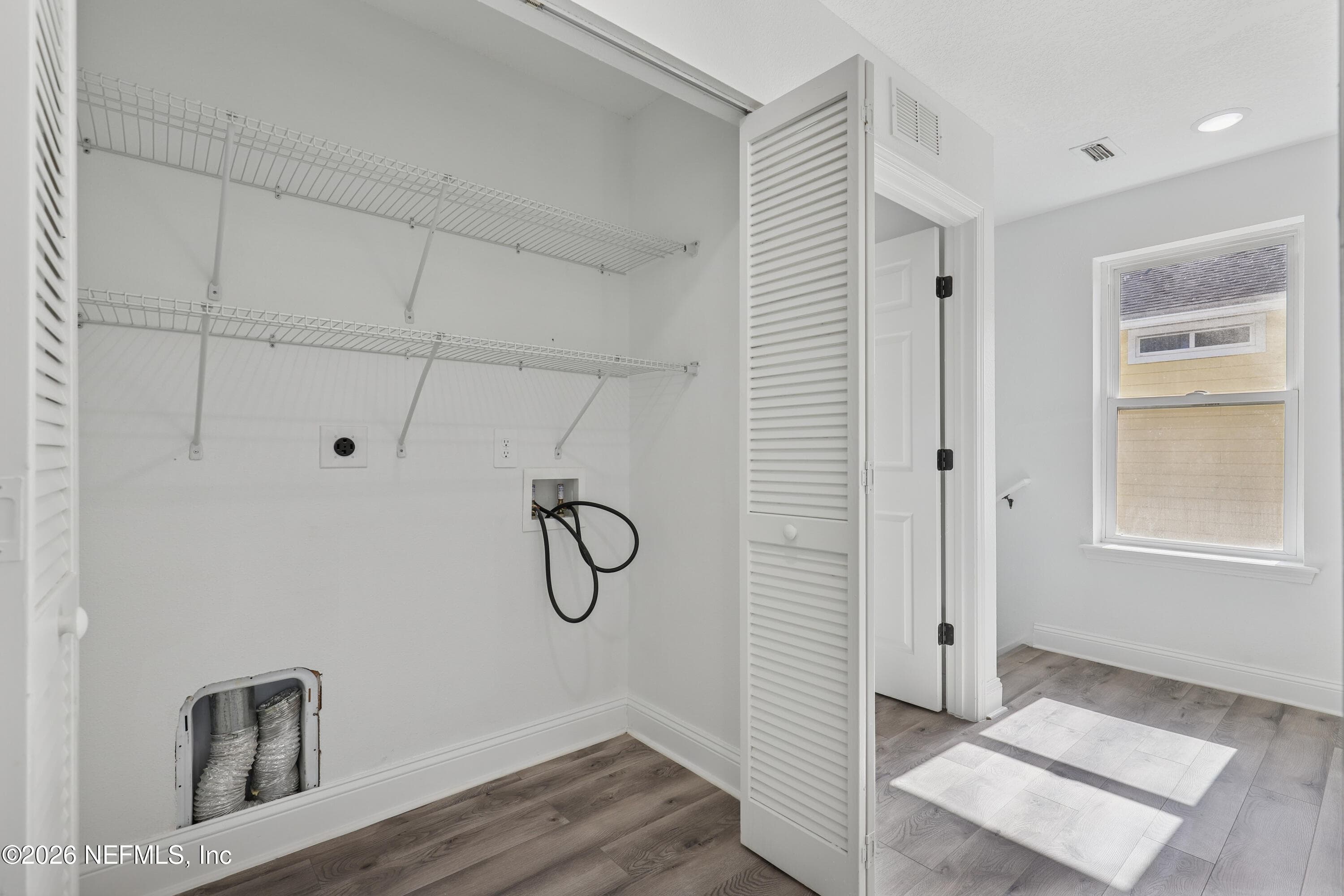 Laundry Closet w/ Hook ups — 1022 PENMAN Road, Jacksonville Beach, FL 32250