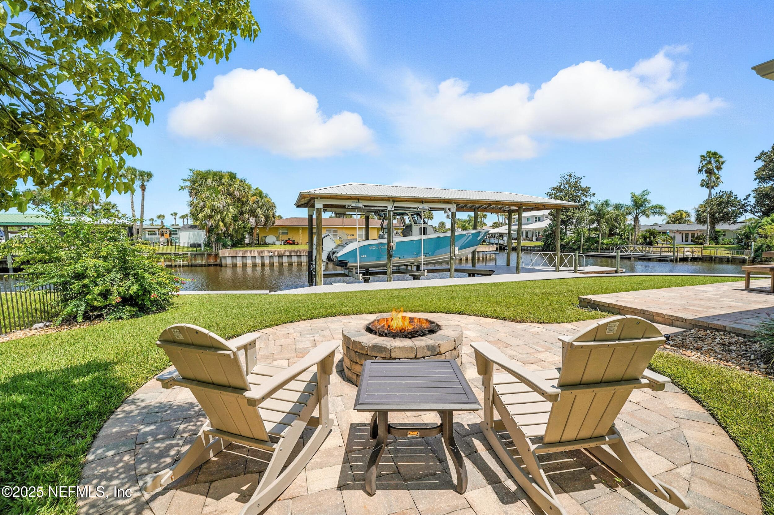 fire pit view of boat lift — 3367 ROYAL PALM Drive, Jacksonville, FL 32250