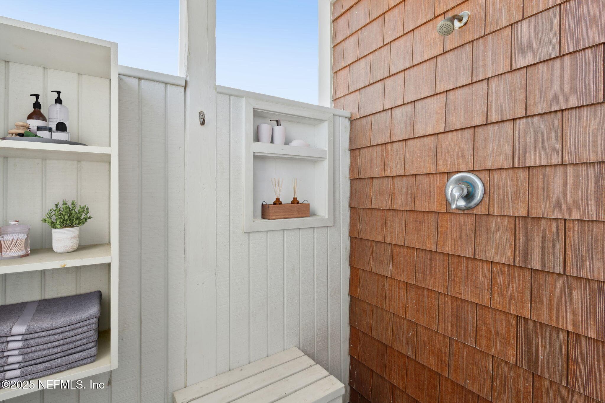... and enjoy the invigorating sensation of an outdoor shower. — 822 S FLETCHER Avenue, Fernandina Beach, FL 32034