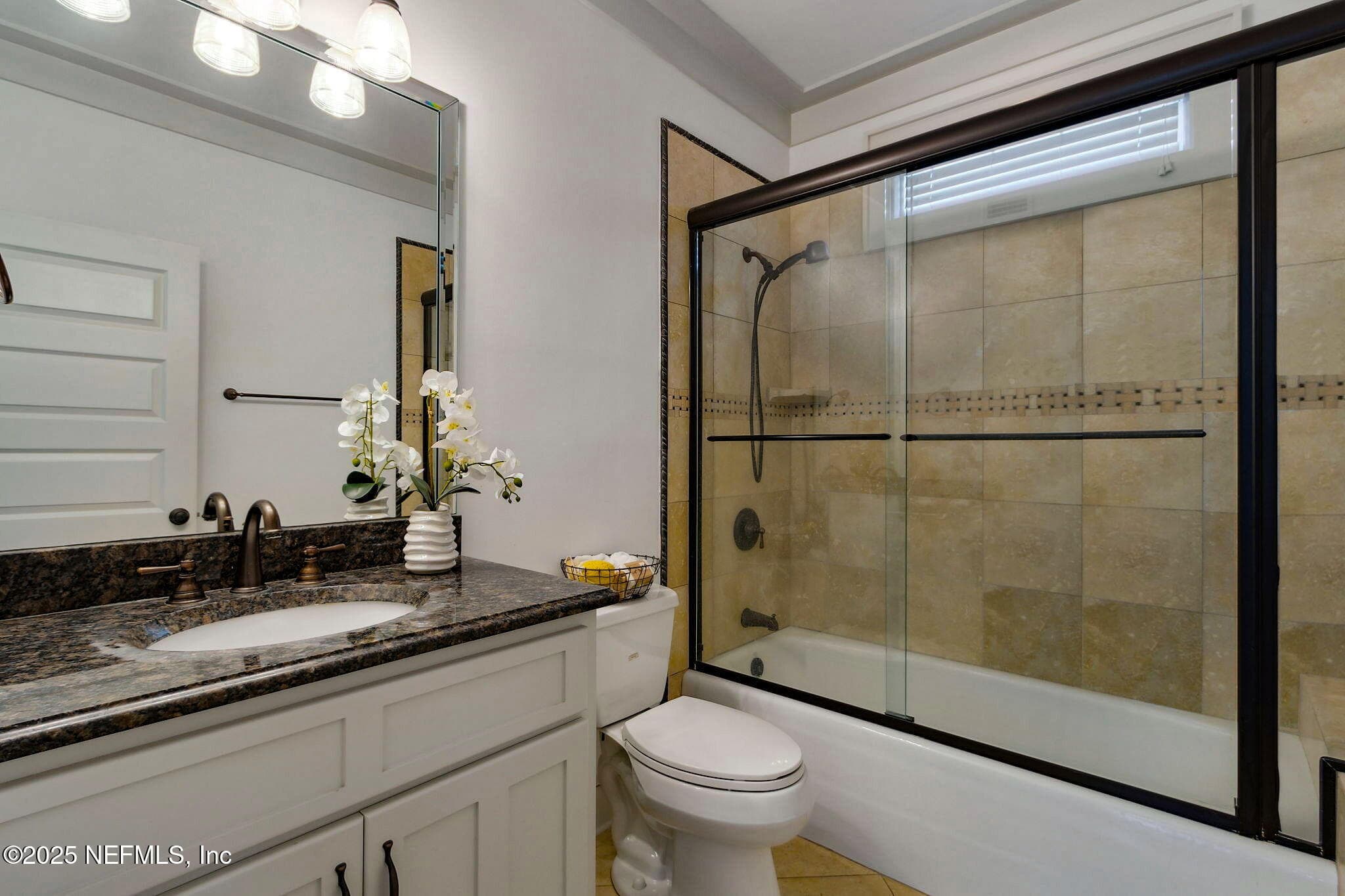 ... and, all bedrooms are ensuite with finely appointed fixtures, granite vanities and glass shower doors. — 822 S FLETCHER Avenue, Fernandina Beach, FL 32034