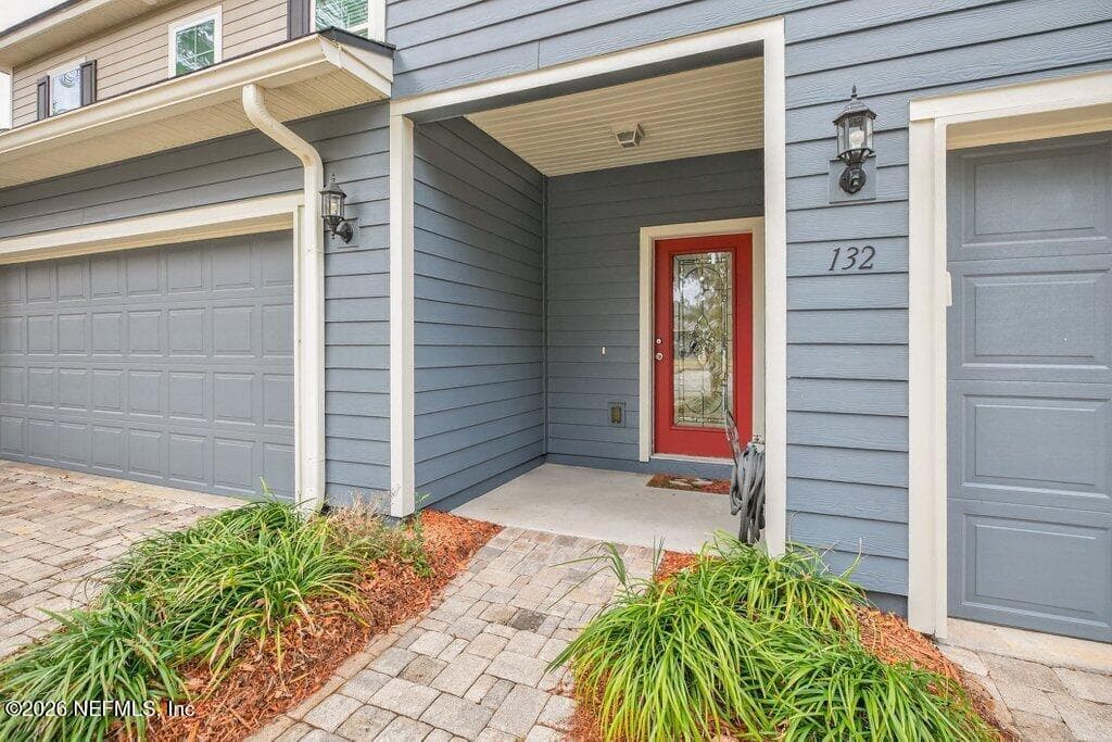 Arriving home to 2-car garage & covered entry — 132 MAGNOLIA CREEK Walk, Ponte Vedra, FL 32081