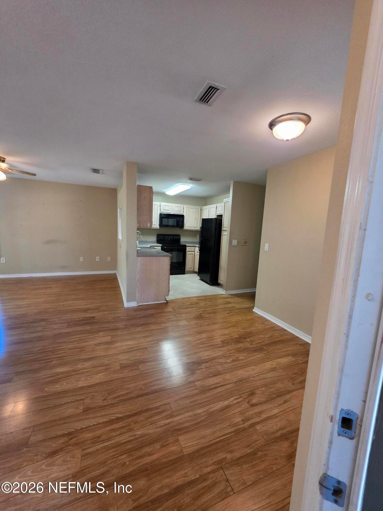 Entrance to open living room, dining and kitchen — 10150 BELLE RIVE Boulevard 2205, Jacksonville, FL 32256