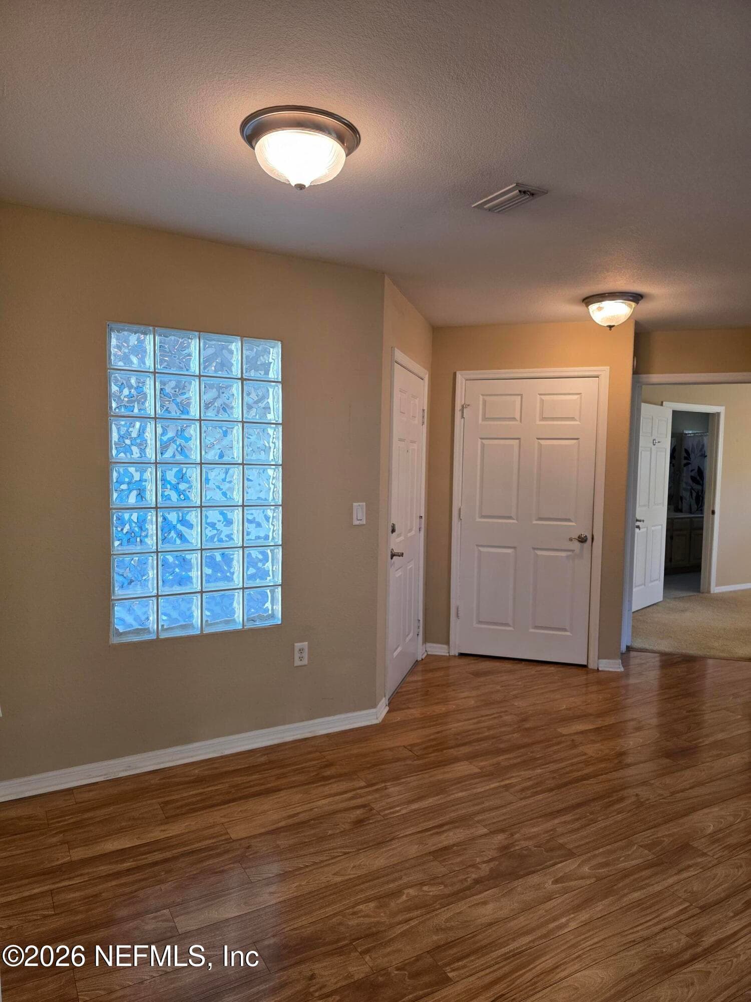 Dining area, with coat closet — 10150 BELLE RIVE Boulevard 2205, Jacksonville, FL 32256