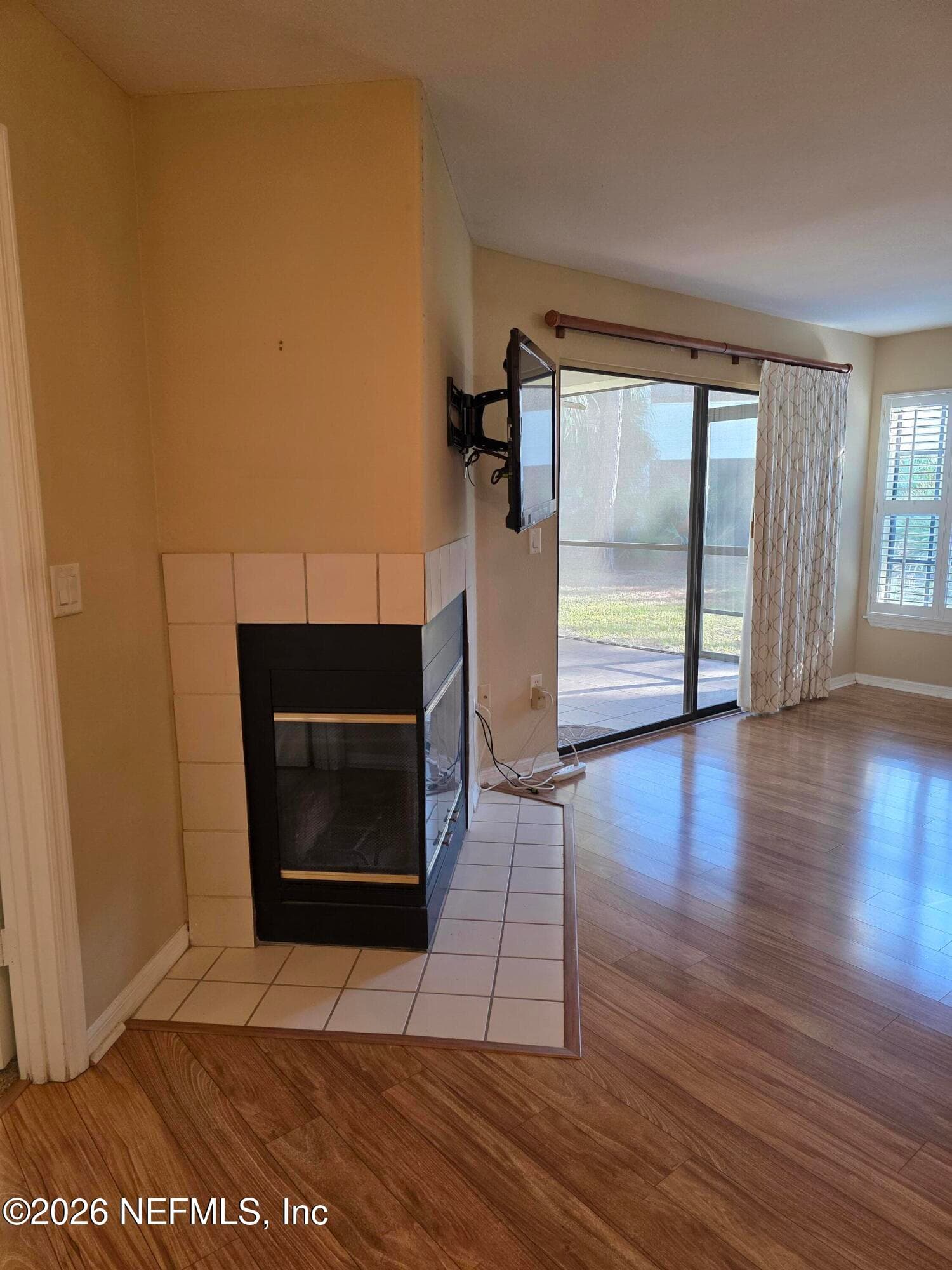 fireplace to screened porch/lanai — 10150 BELLE RIVE Boulevard 2205, Jacksonville, FL 32256