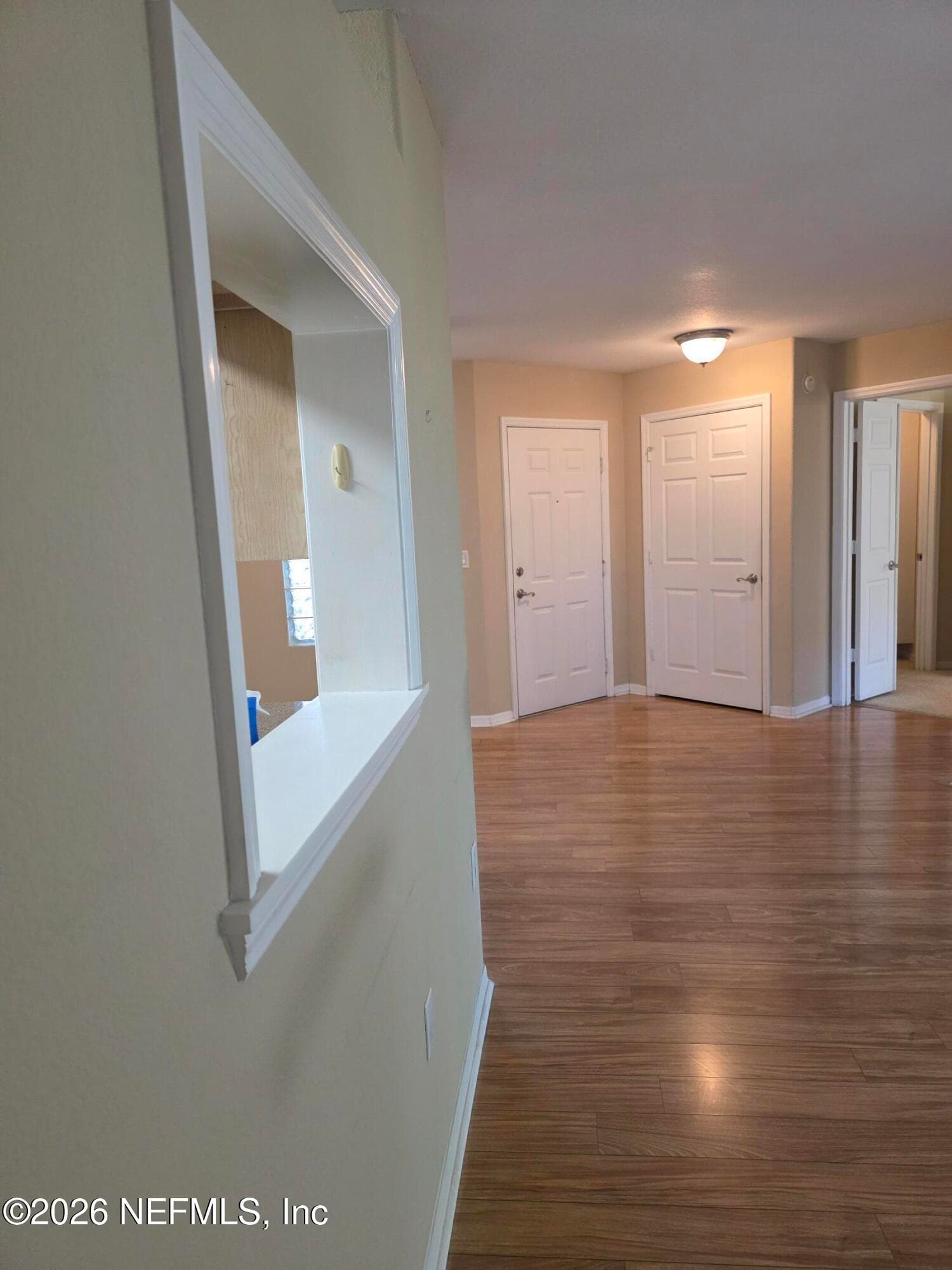 Peep thru window to kitchen — 10150 BELLE RIVE Boulevard 2205, Jacksonville, FL 32256