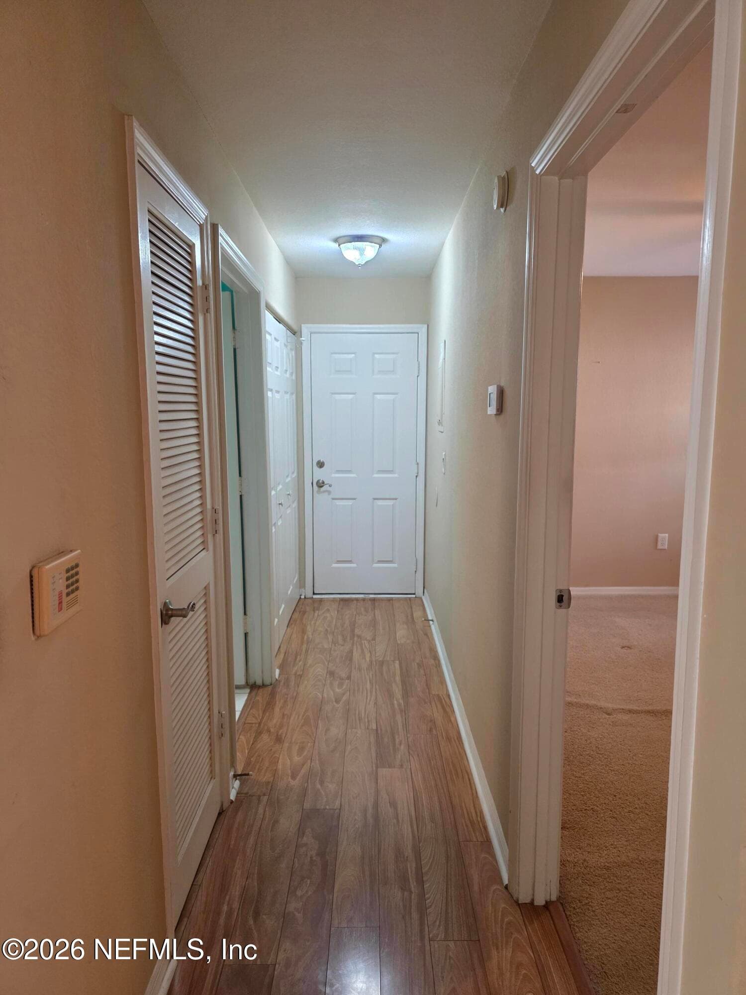 Hallway to your own garage...and guest wing — 10150 BELLE RIVE Boulevard 2205, Jacksonville, FL 32256