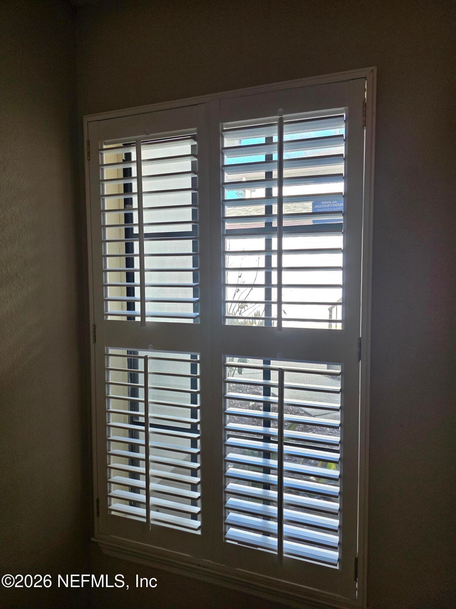 Custom plantation shutters in 2nd bedroom — 10150 BELLE RIVE Boulevard 2205, Jacksonville, FL 32256