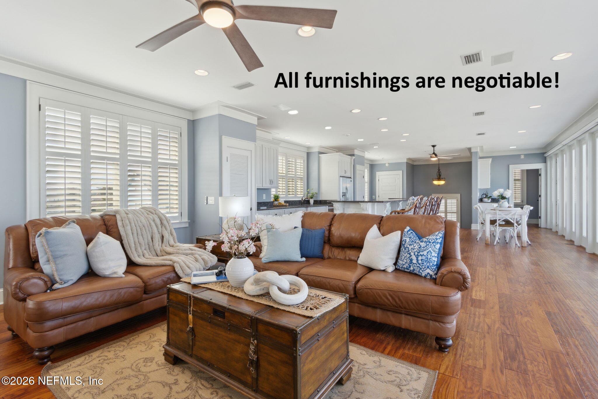 ... flooding the space with natural light and leading to a sprawling deck. — 822 S FLETCHER Avenue, Fernandina Beach, FL 32034