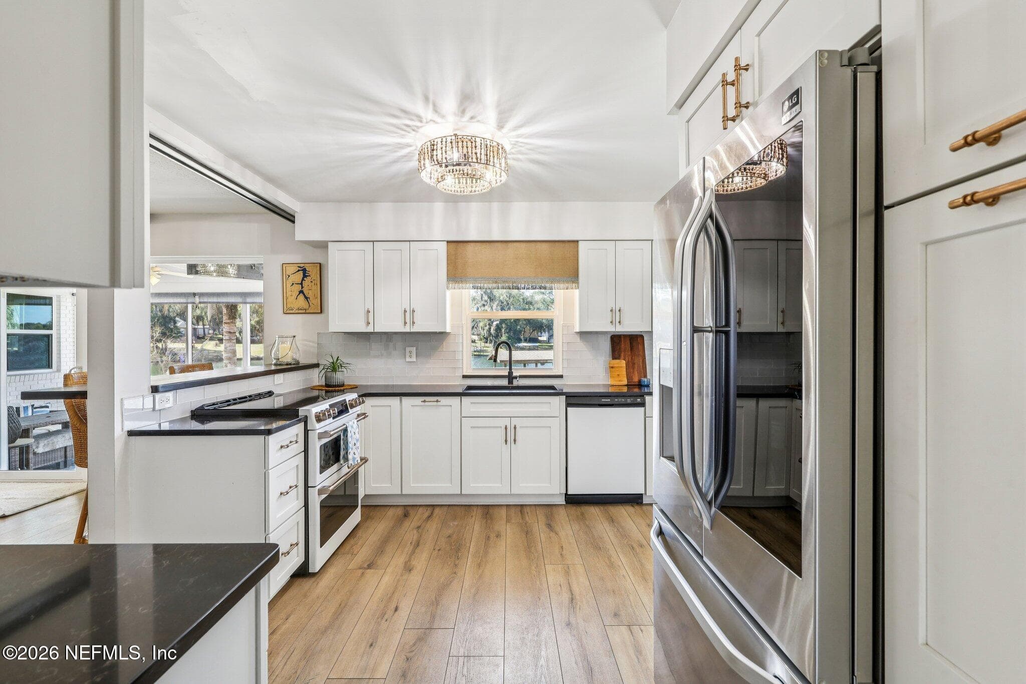 Updated kitchen with white cabinetry and gold accents — 244 JESSIE LEE Court, Green Cove Springs, FL 32043