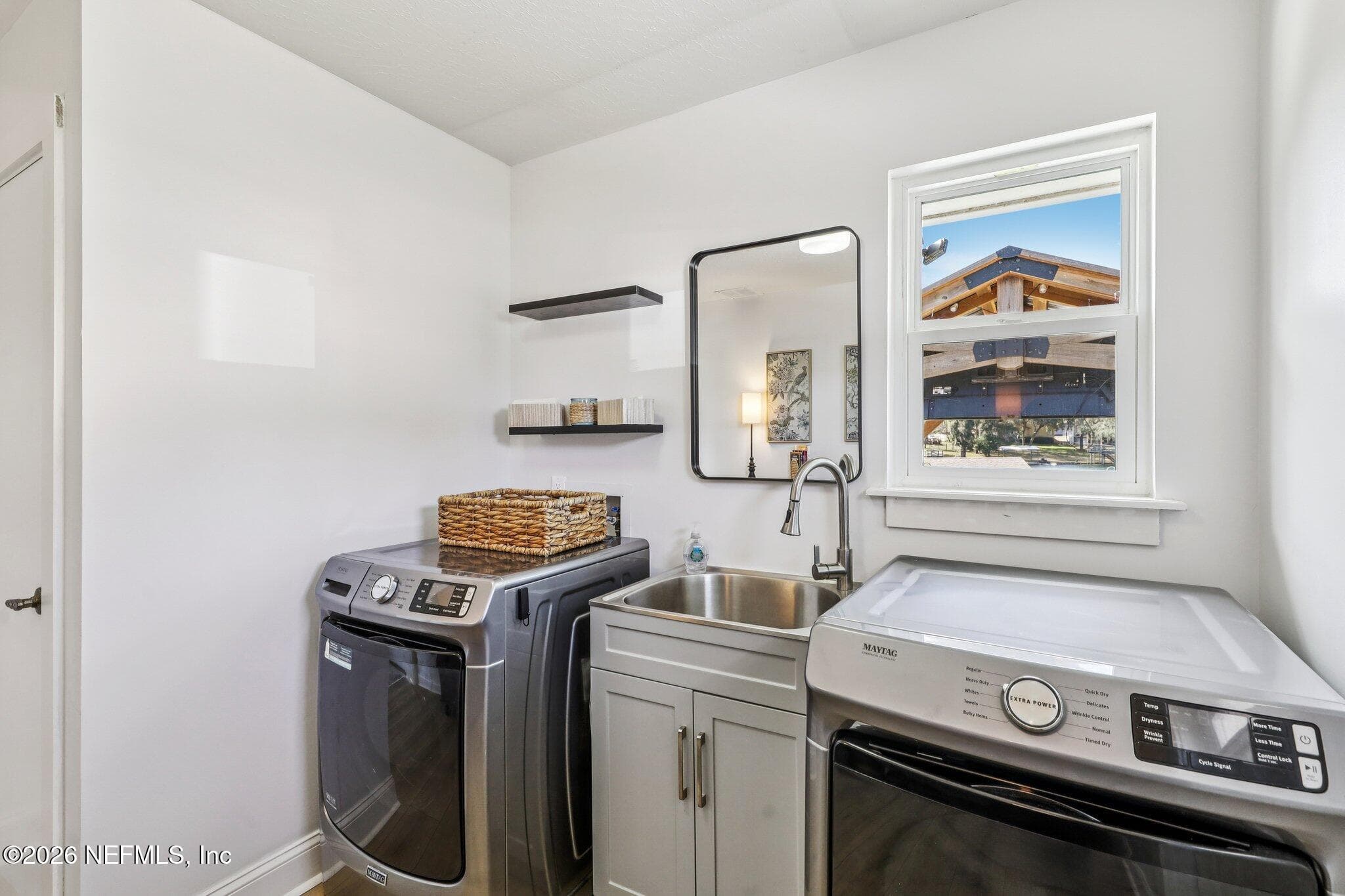 Spacious laundry room with added storage and utility sink — 244 JESSIE LEE Court, Green Cove Springs, FL 32043