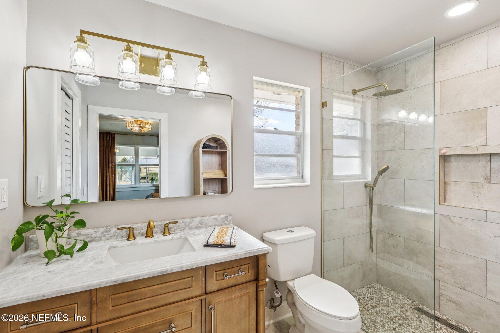 Primary bath with walk in shower and marble topped vanity — 244 JESSIE LEE Court, Green Cove Springs, FL 32043