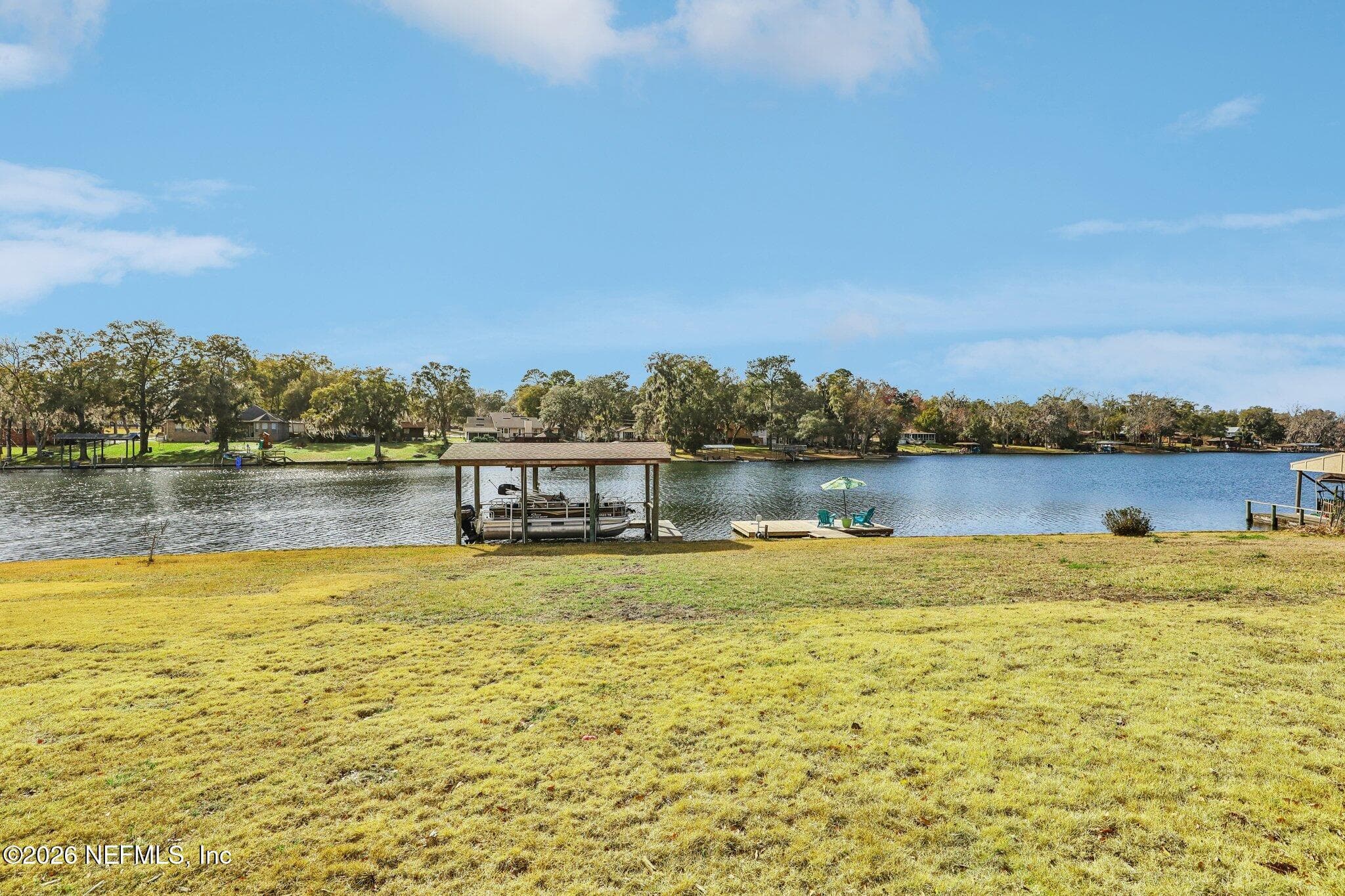 Backyard with peaceful lake views and room to relax — 244 JESSIE LEE Court, Green Cove Springs, FL 32043