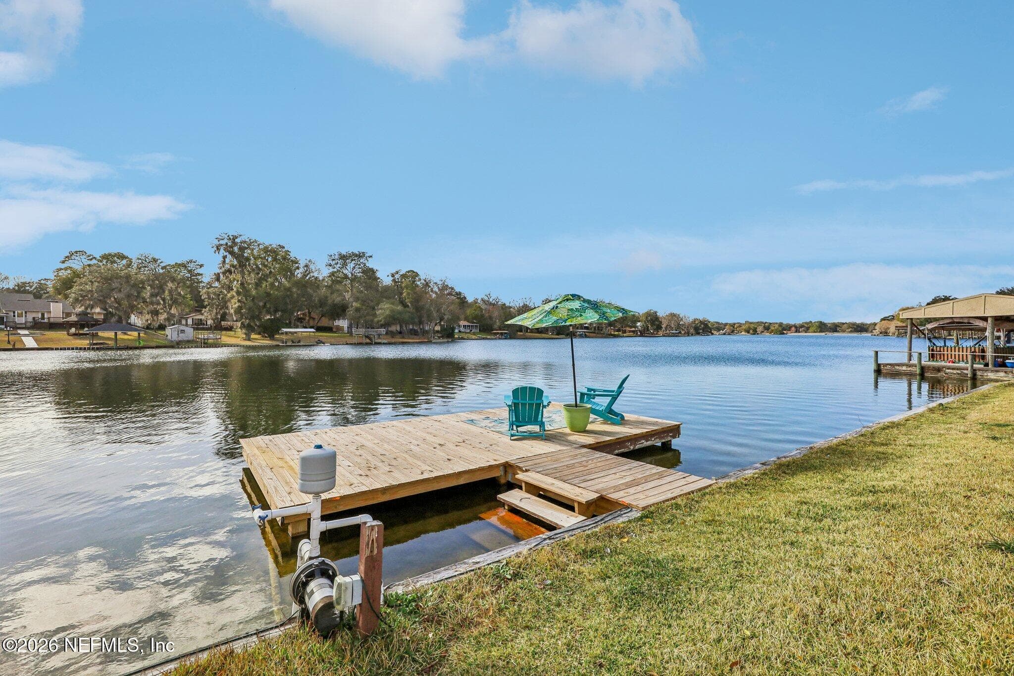 Lakeside seating area for relaxing by the water — 244 JESSIE LEE Court, Green Cove Springs, FL 32043