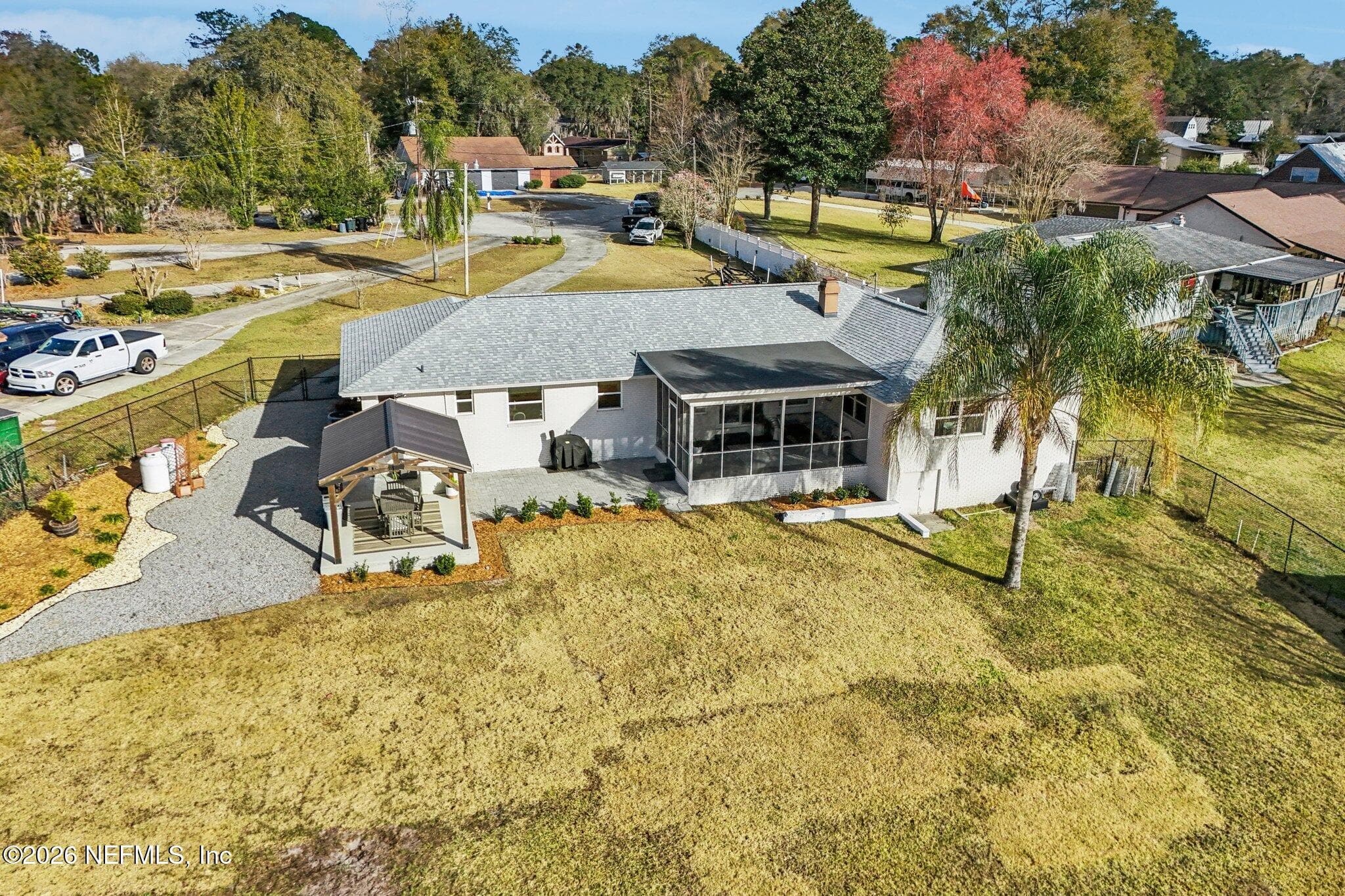 Aerial view of the backyard with screened porch and pergola — 244 JESSIE LEE Court, Green Cove Springs, FL 32043