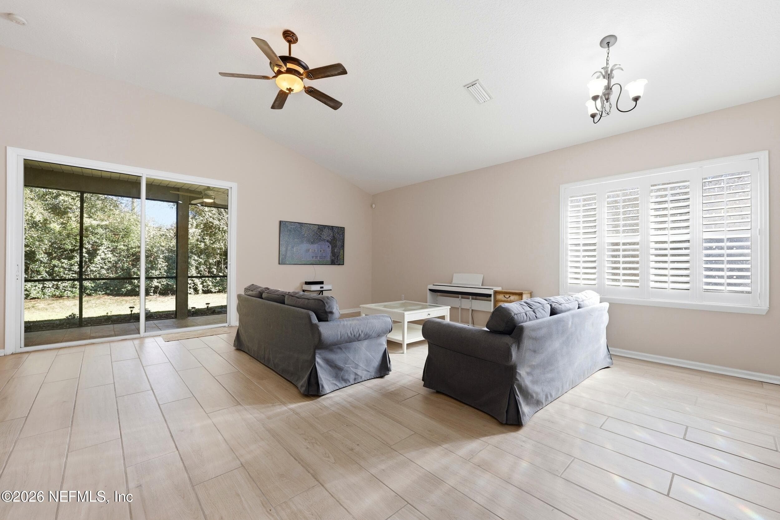 Let more light into the home and give you prime bird-watching view — 96177 LONG BEACH Drive, Fernandina Beach, FL 32034