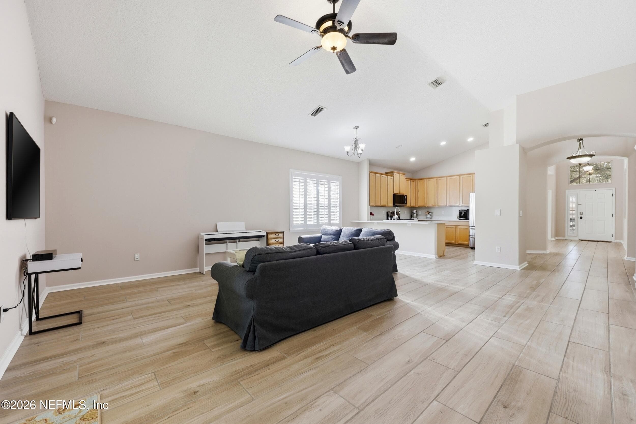 Open Concept Living. This view allows you to see the kitchen — 96177 LONG BEACH Drive, Fernandina Beach, FL 32034