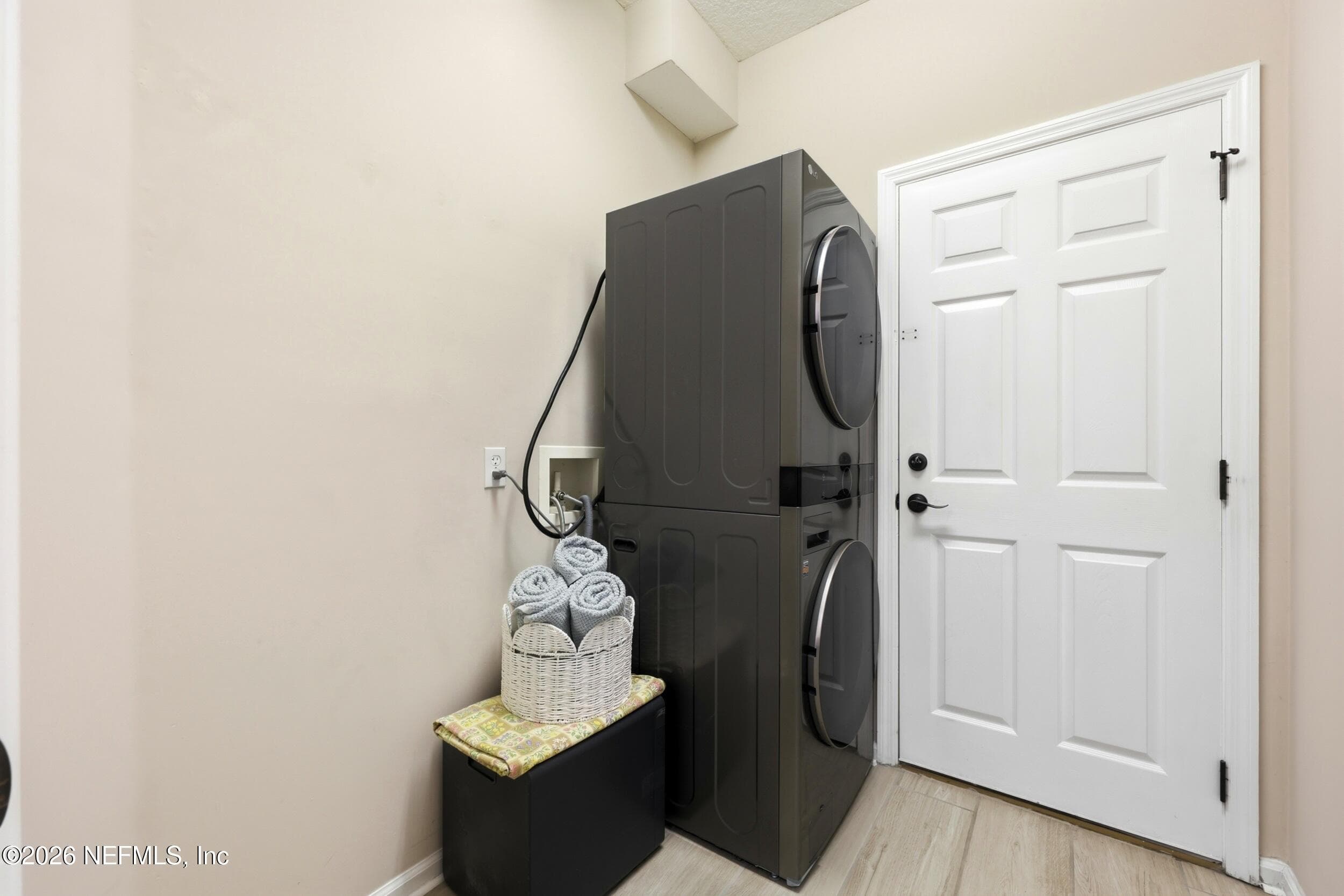 Door leads to 2-car garage — 96177 LONG BEACH Drive, Fernandina Beach, FL 32034
