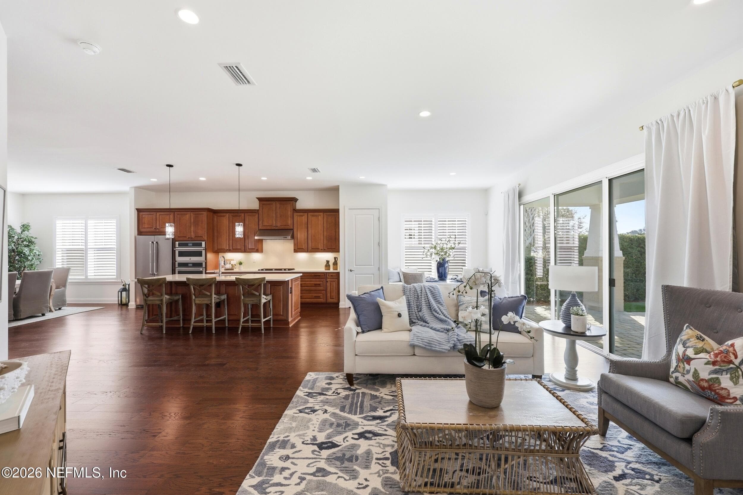 Expansive windows invite the outdoors in, creating bright, uplifting spaces that feel as good as they look — every single day. — 568 TIMBER BRIDGE Lane, Atlantic Beach, FL 32233