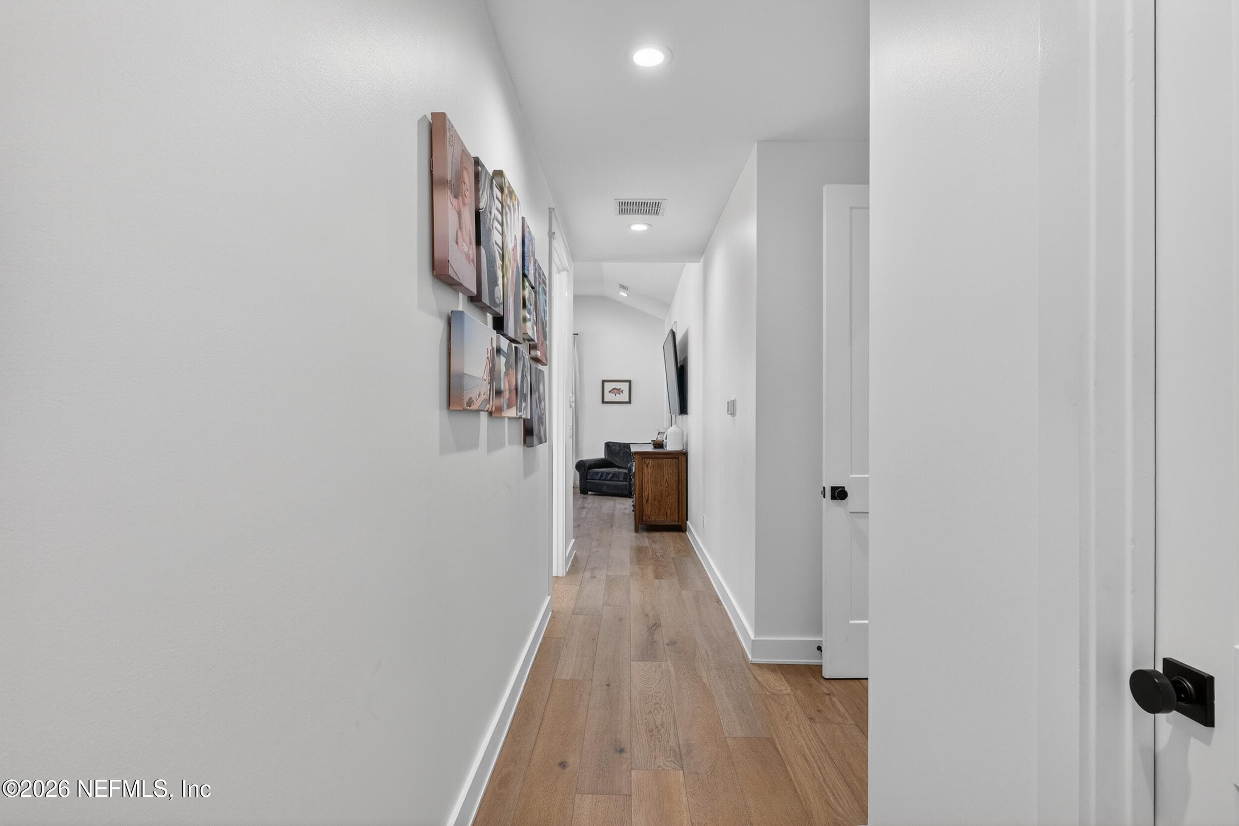 Primary suite hallway, has separate garage entrance — 10800 COUNTY ROAD 13 N, St. Augustine, FL 32092