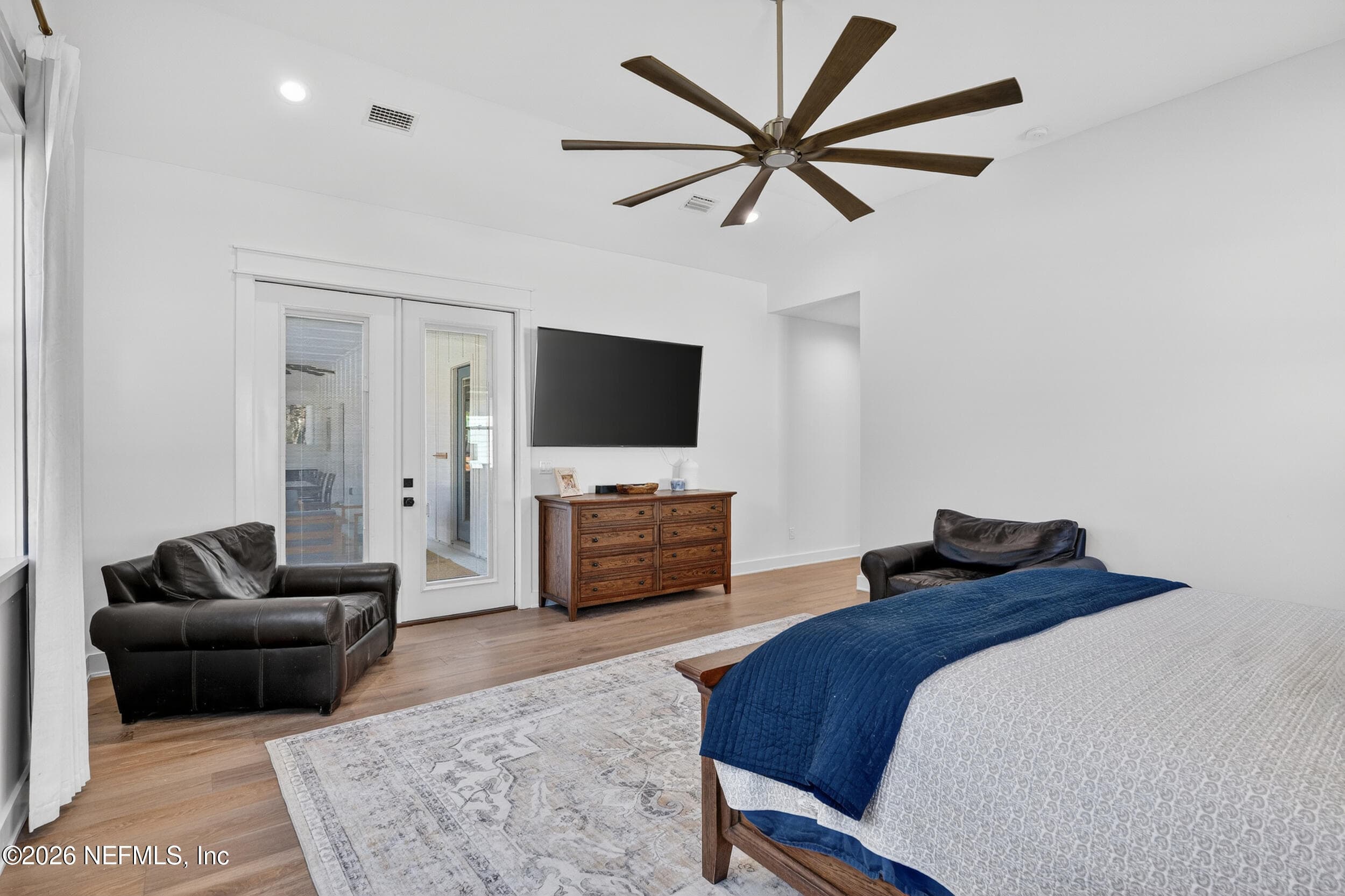 Primary Suite-doors to the pool and backyard — 10800 COUNTY ROAD 13 N, St. Augustine, FL 32092