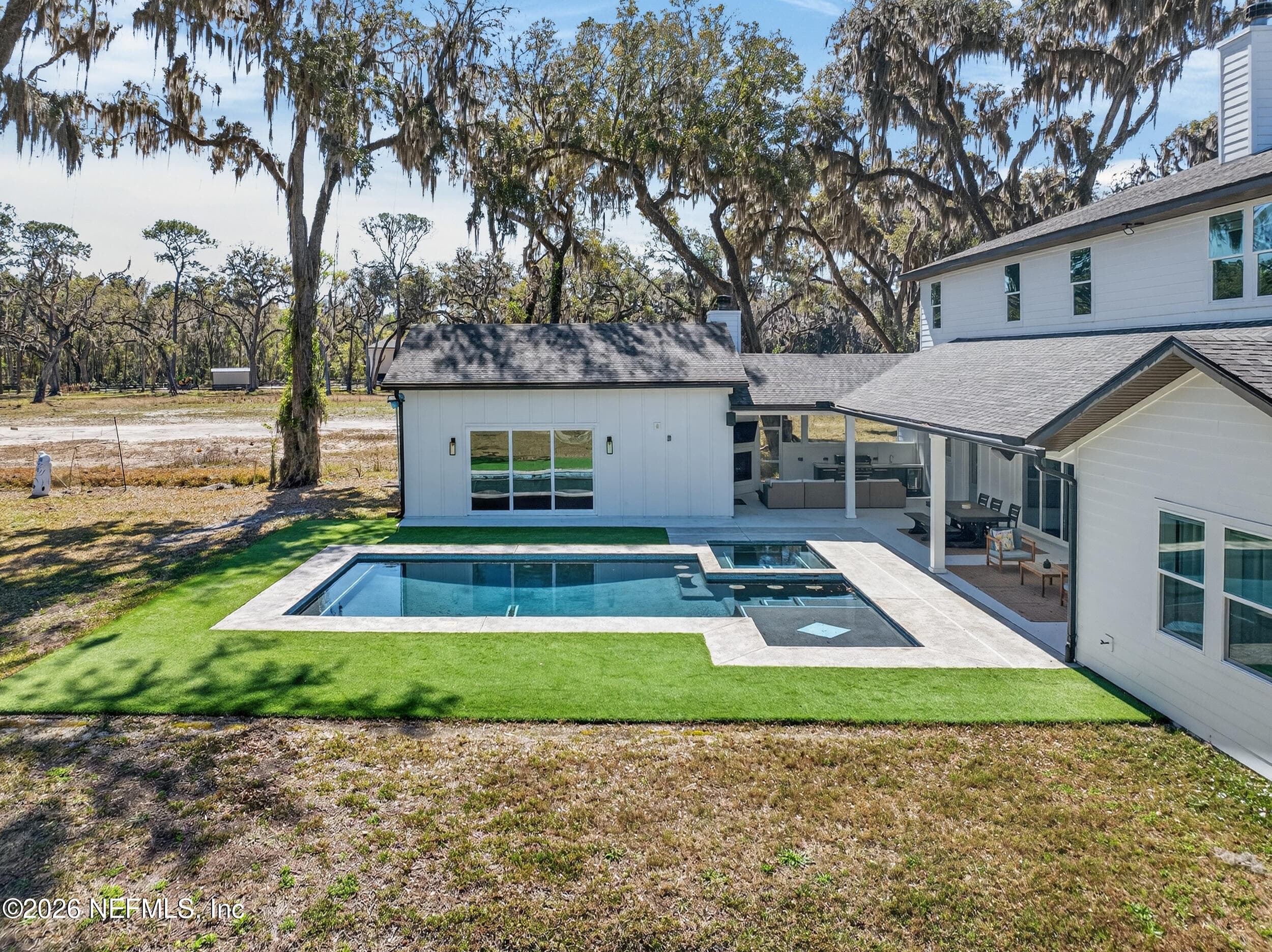 Poolhouse entrance from outside. — 10800 COUNTY ROAD 13 N, St. Augustine, FL 32092