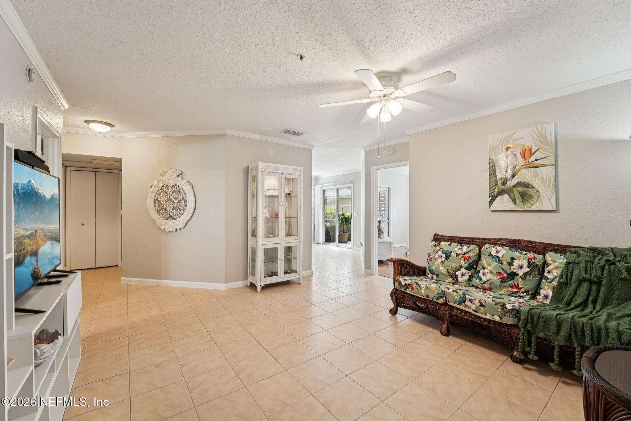 Front room, view into your new home — 1701 THE GREENS Way 212, Jacksonville Beach, FL 32250