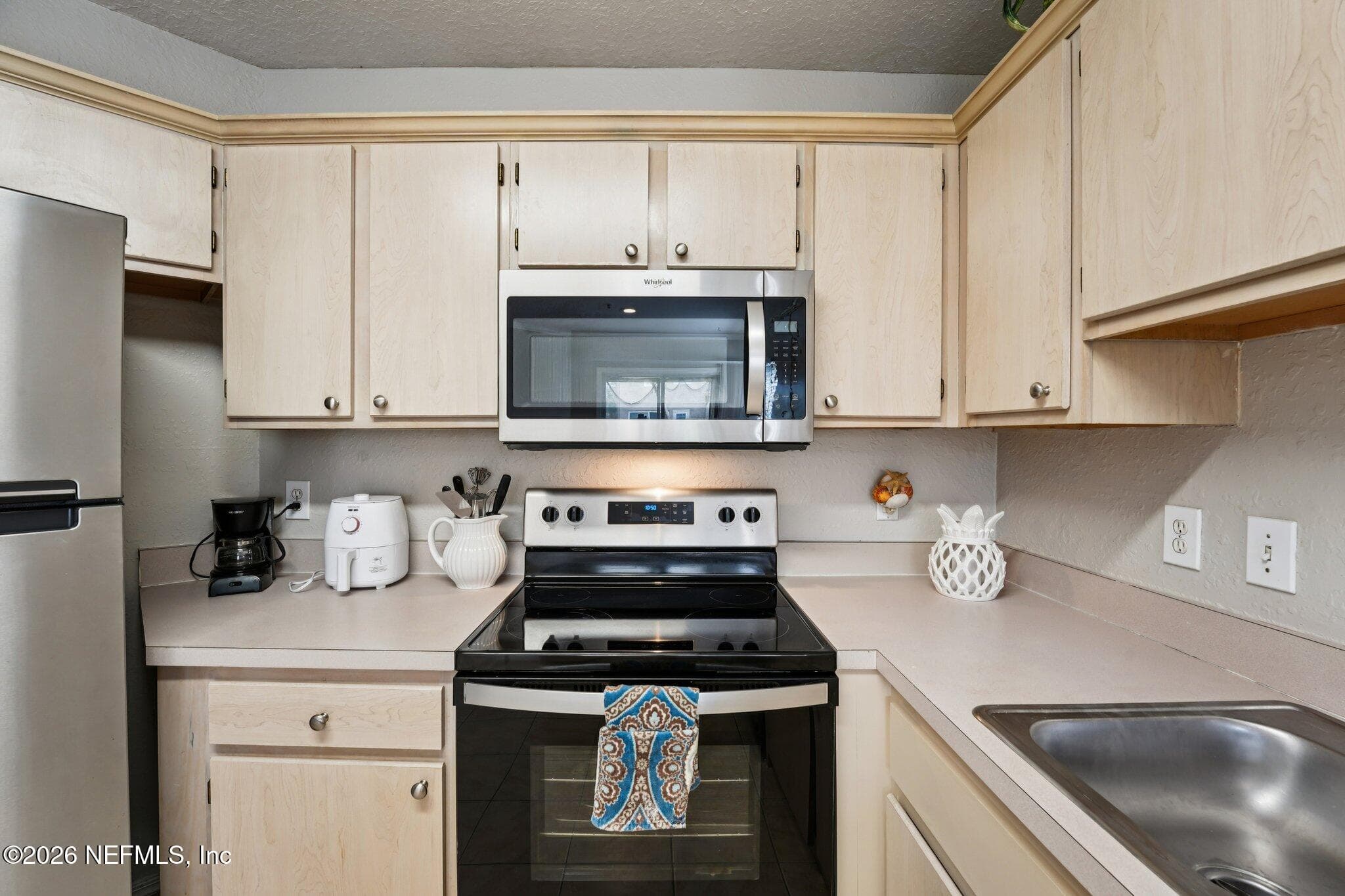 new Appliances and lots of cabinets — 1701 THE GREENS Way 212, Jacksonville Beach, FL 32250