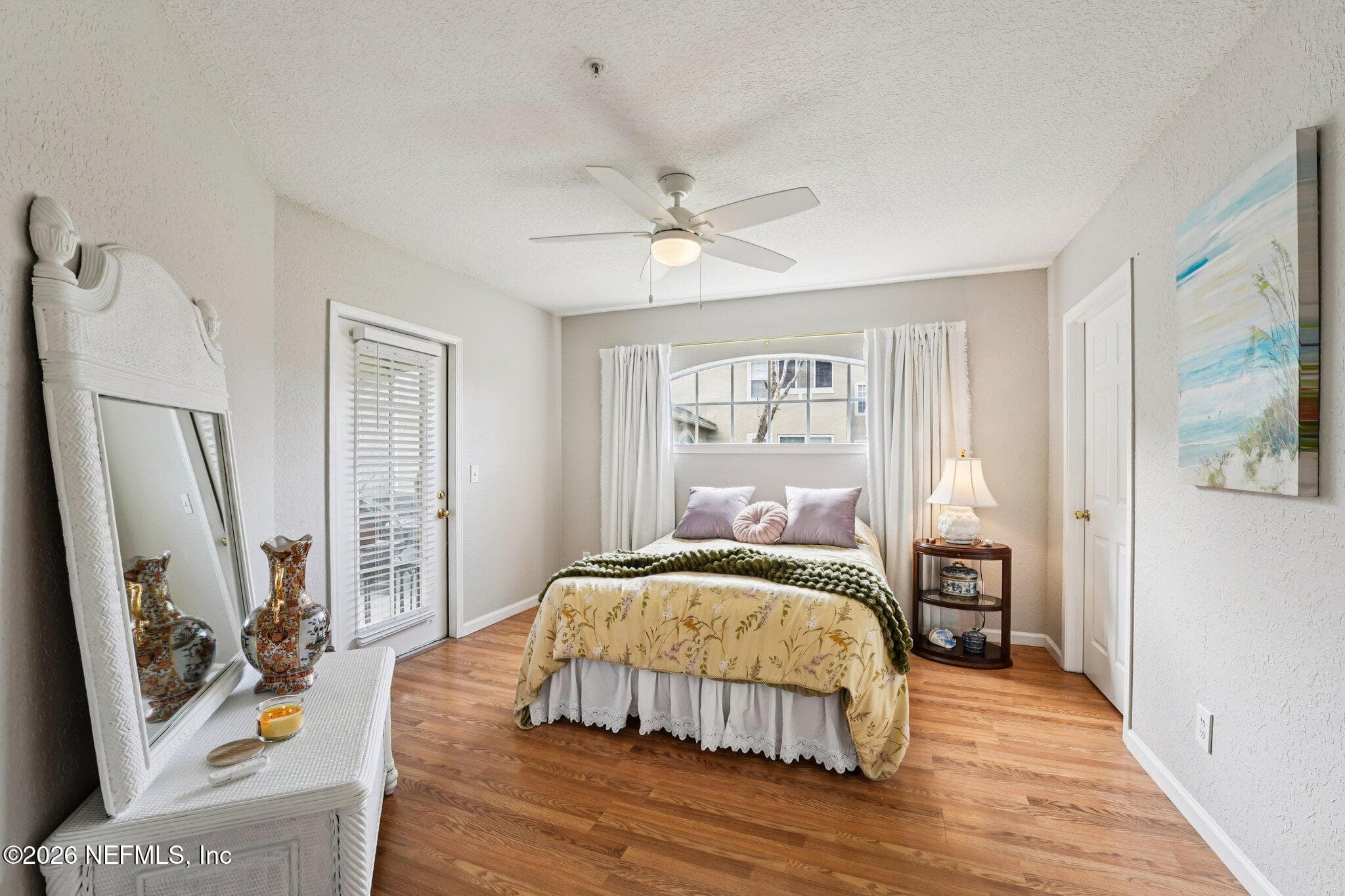 Primary suite with porch access — 1701 THE GREENS Way 212, Jacksonville Beach, FL 32250