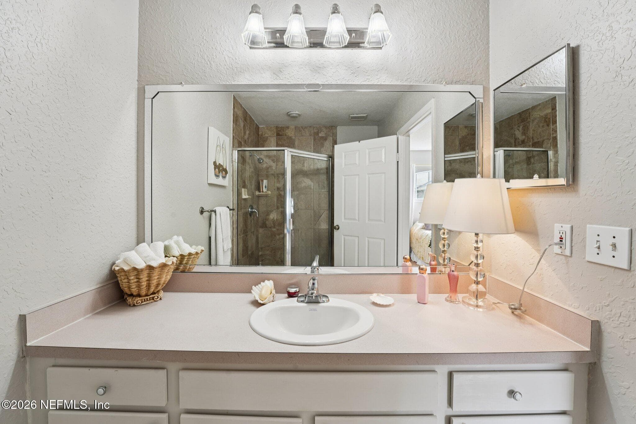 1st Primary suite bathroom — 1701 THE GREENS Way 212, Jacksonville Beach, FL 32250