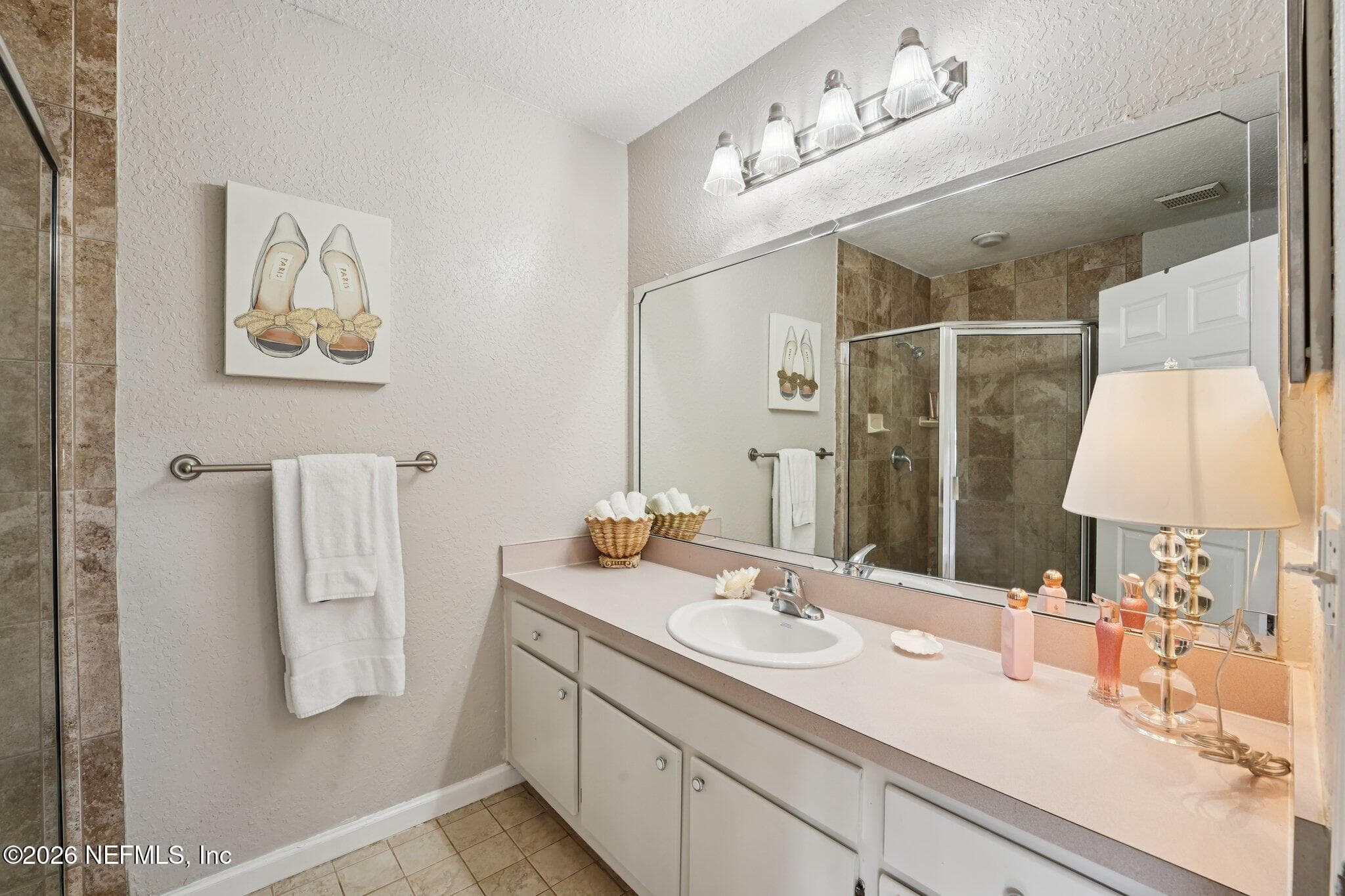 1st Primary suite bathroom — 1701 THE GREENS Way 212, Jacksonville Beach, FL 32250