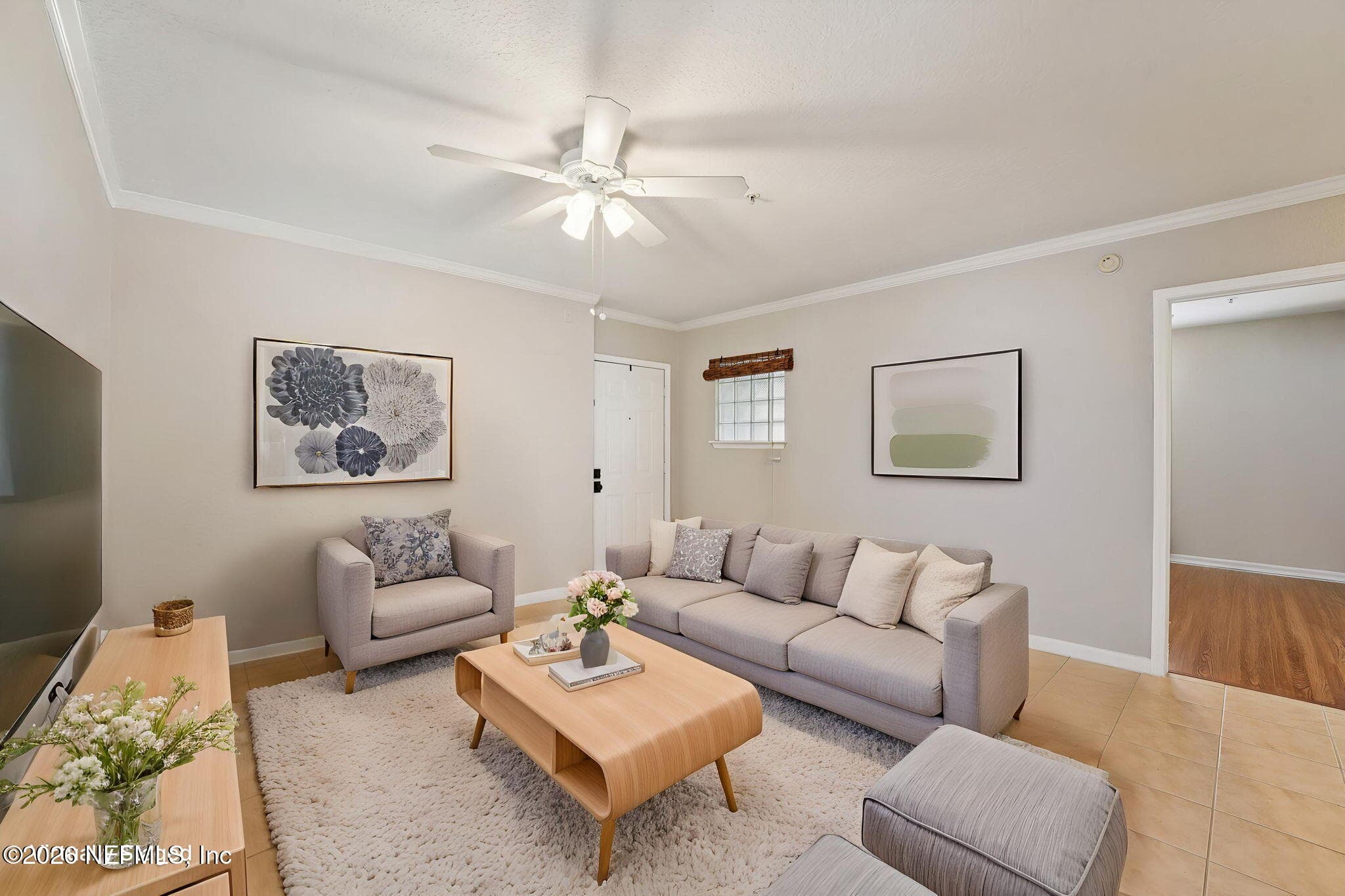 Front room (Virtually Staged) — 1701 THE GREENS Way 212, Jacksonville Beach, FL 32250