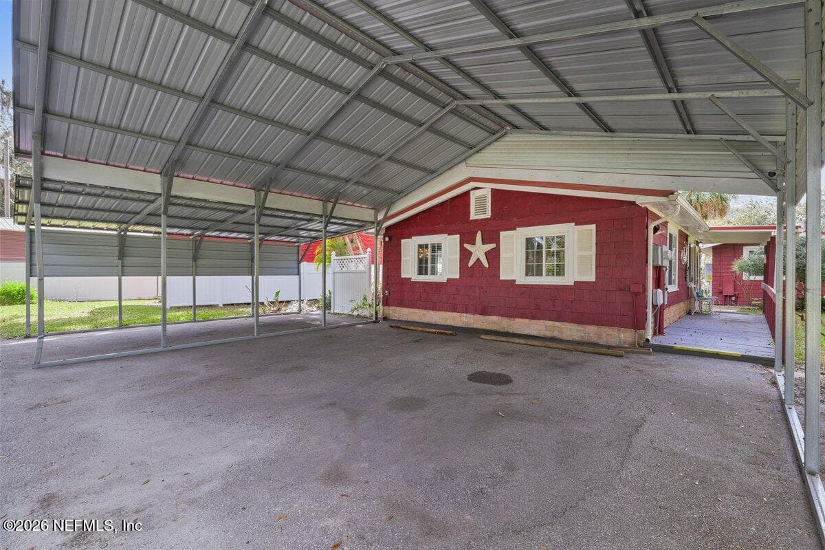 2-car-carport and a single carport to the left — 101 ORANGE Street, Satsuma, FL 32189