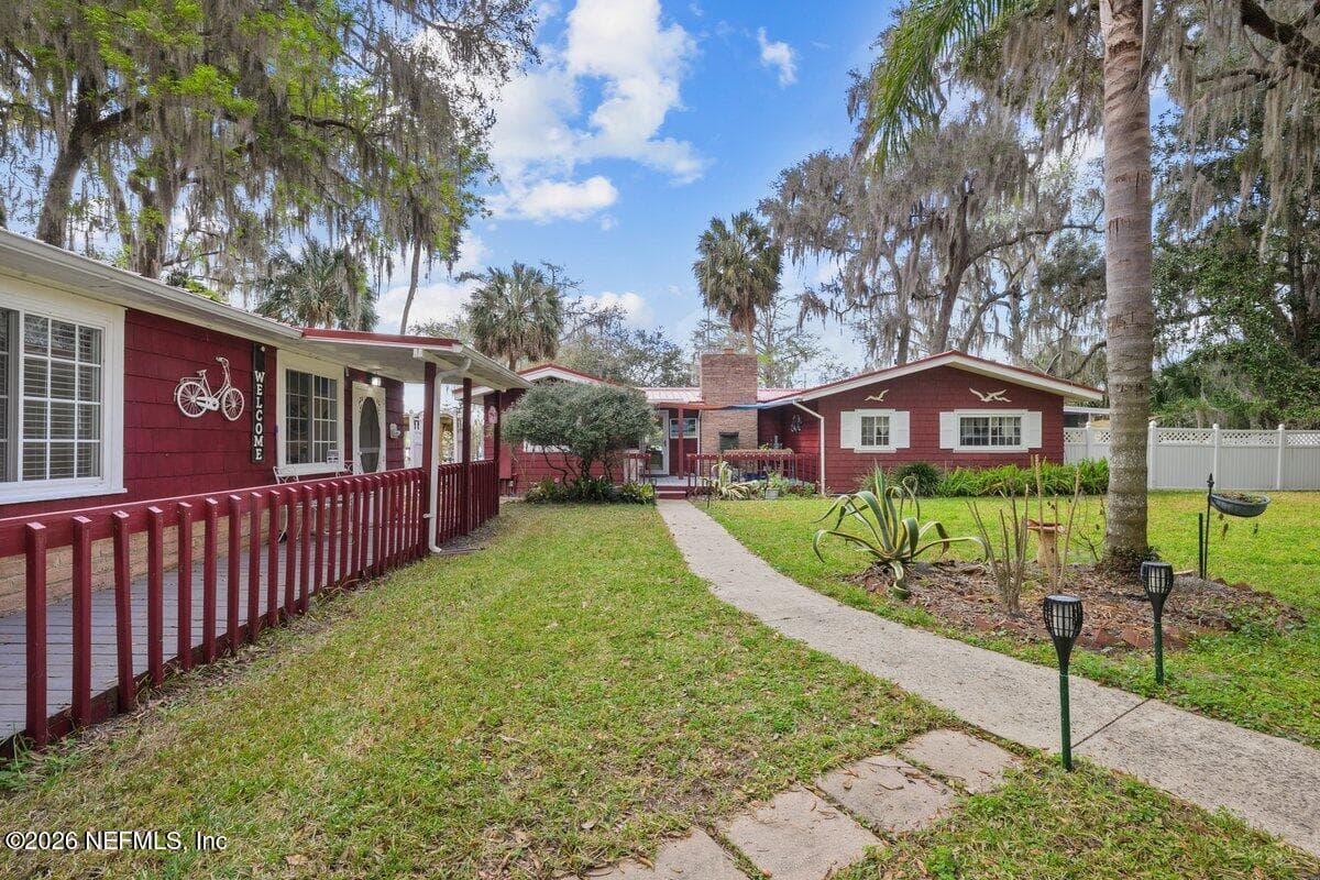 view of guest House on left main house to right — 101 ORANGE Street, Satsuma, FL 32189