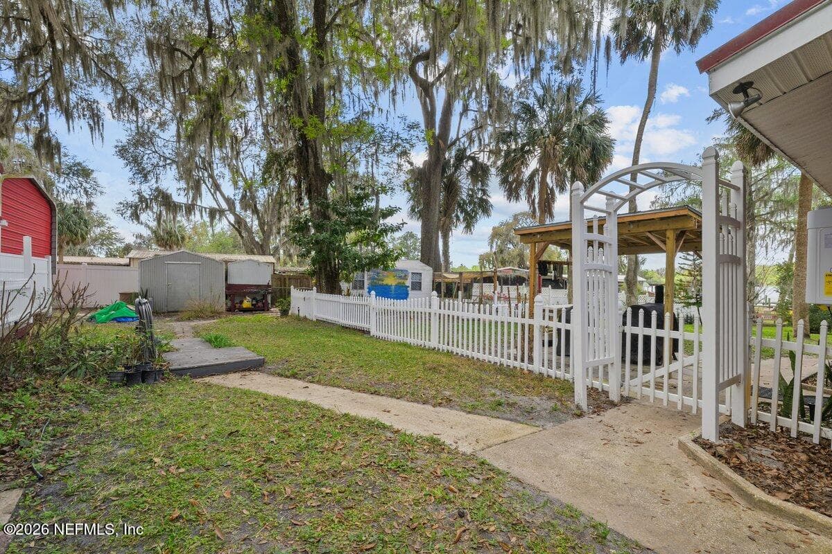 side walk to guest house and sheds — 101 ORANGE Street, Satsuma, FL 32189