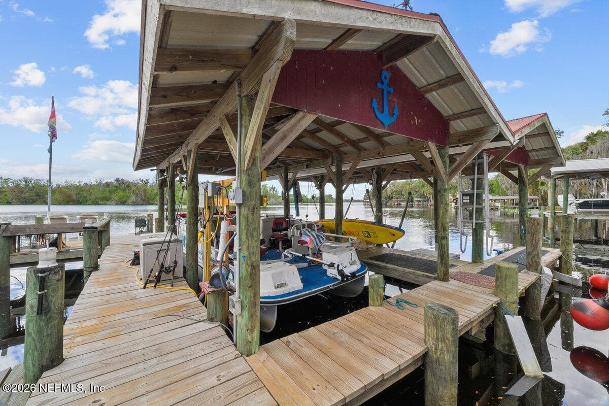 2 Covered boat slips with lifts and more uncovered boat parking — 101 ORANGE Street, Satsuma, FL 32189