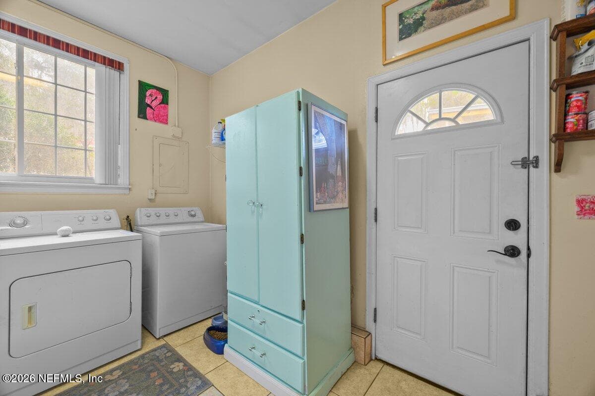 Laundry room/mud room off of kitchen with back door — 101 ORANGE Street, Satsuma, FL 32189