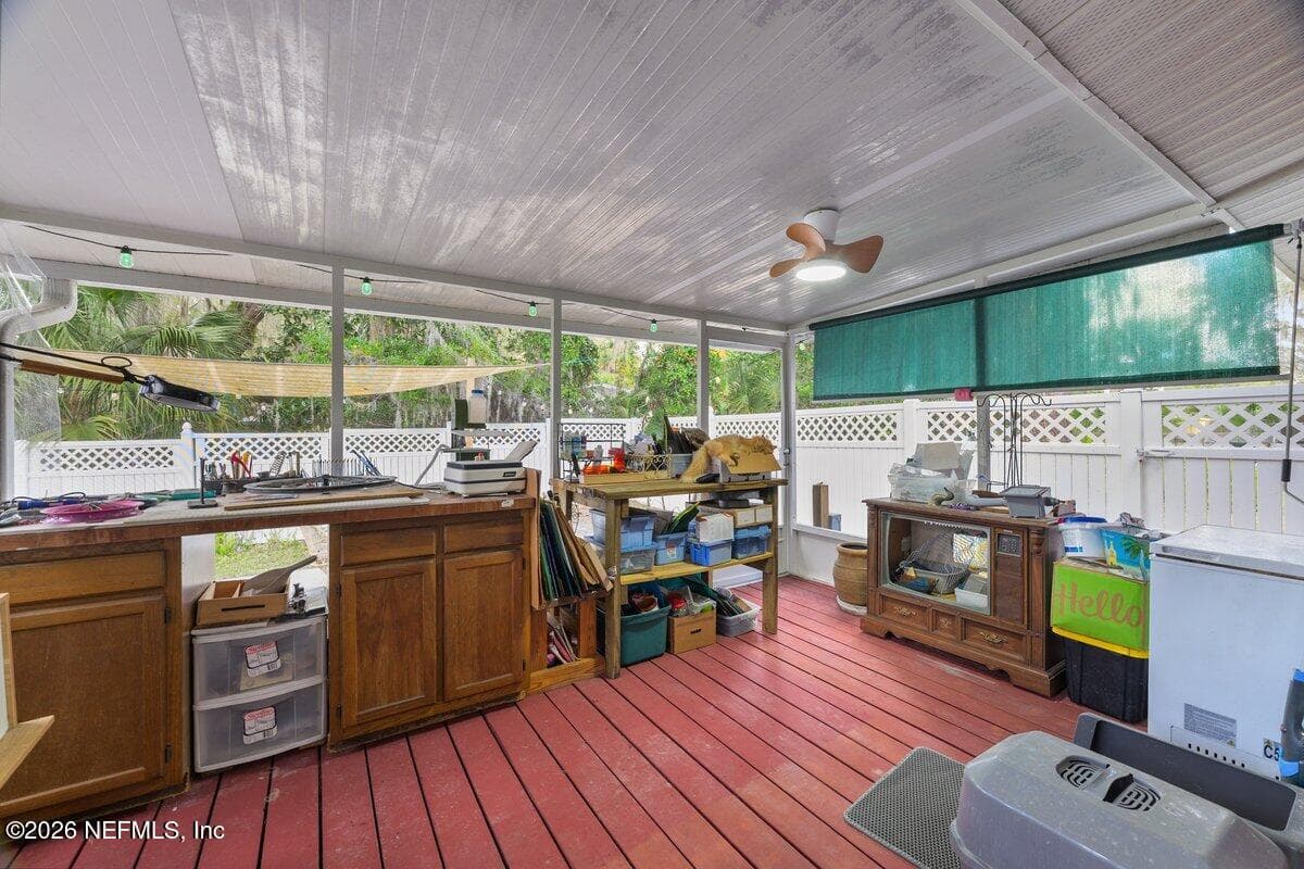 Cover, screen room off of Master Suite — 101 ORANGE Street, Satsuma, FL 32189