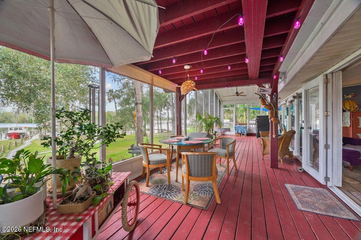 Large back covered screen deck — 101 ORANGE Street, Satsuma, FL 32189