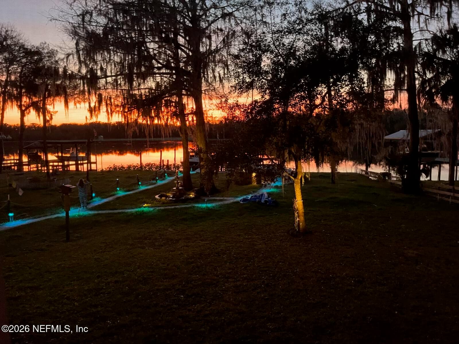 Lighting on Pavers and beautiful sunset in the distance — 101 ORANGE Street, Satsuma, FL 32189