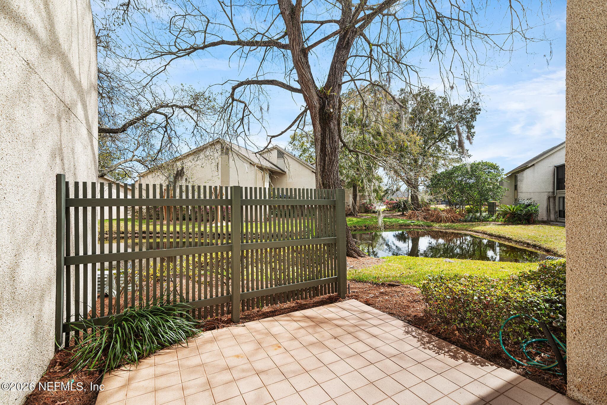 Mature trees and lake views — 10150 LEISURE Lane N 23, Jacksonville, FL 32256