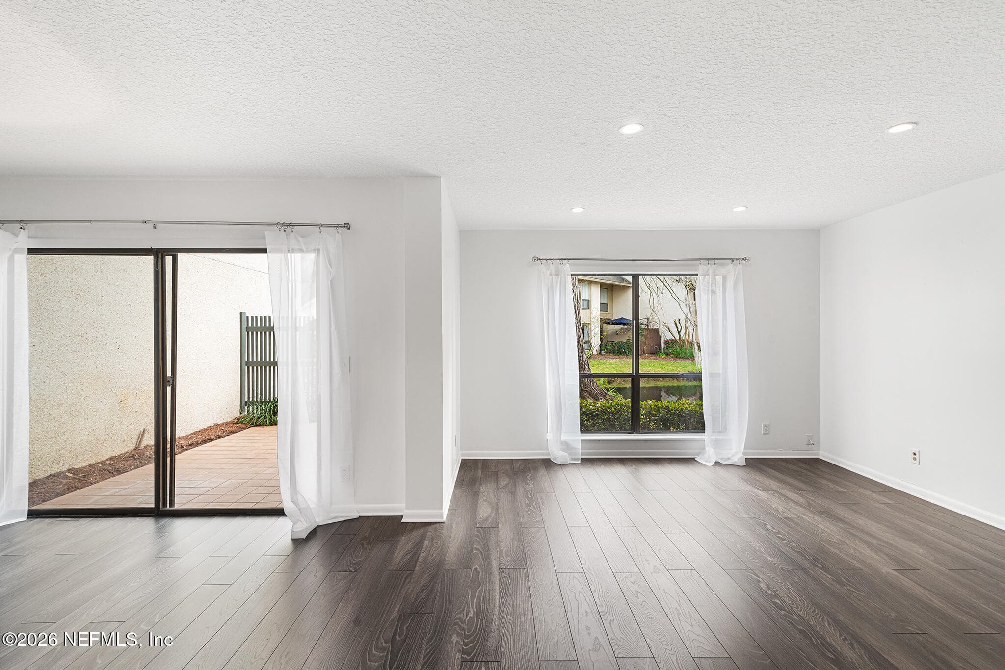 Large open living space with lots of natural light — 10150 LEISURE Lane N 23, Jacksonville, FL 32256