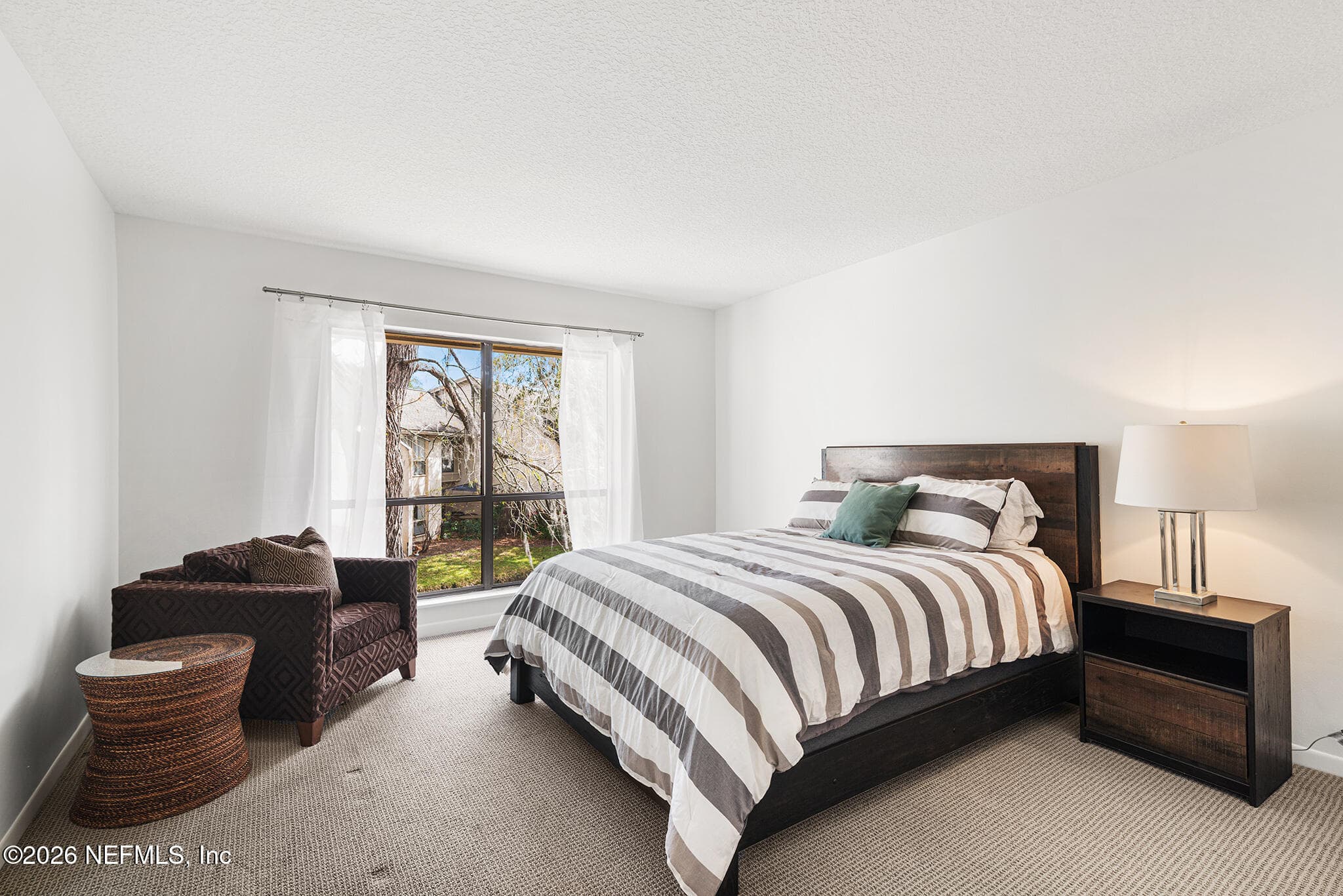 Large guest bedroom with walk-in closet — 10150 LEISURE Lane N 23, Jacksonville, FL 32256