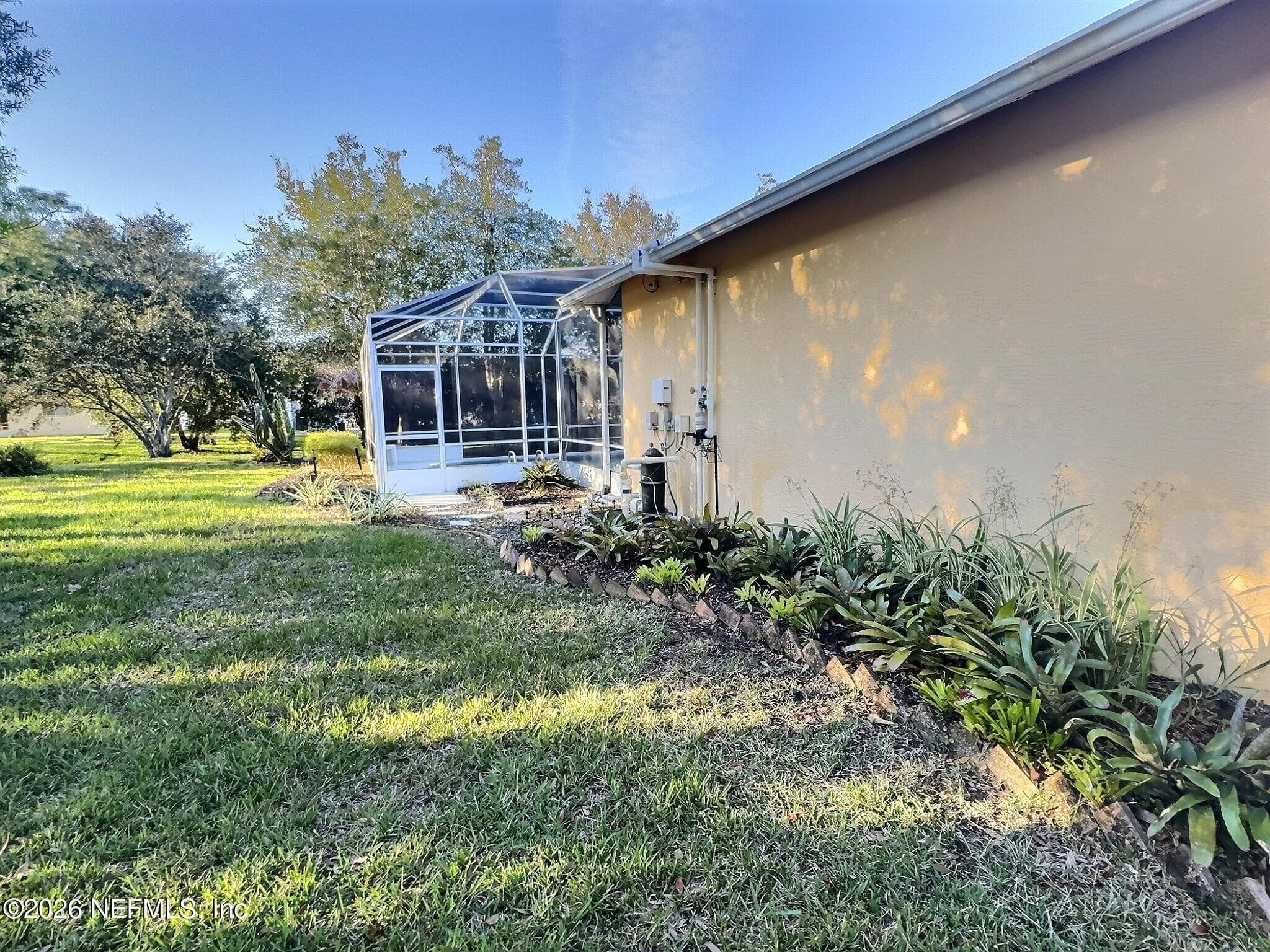 Left — 6 MONTAUK Court, Palm Coast, FL 32164