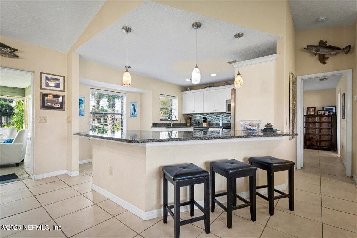 Photo 7 of 109 CORAL REEF Court N, Palm Coast, FL 32137