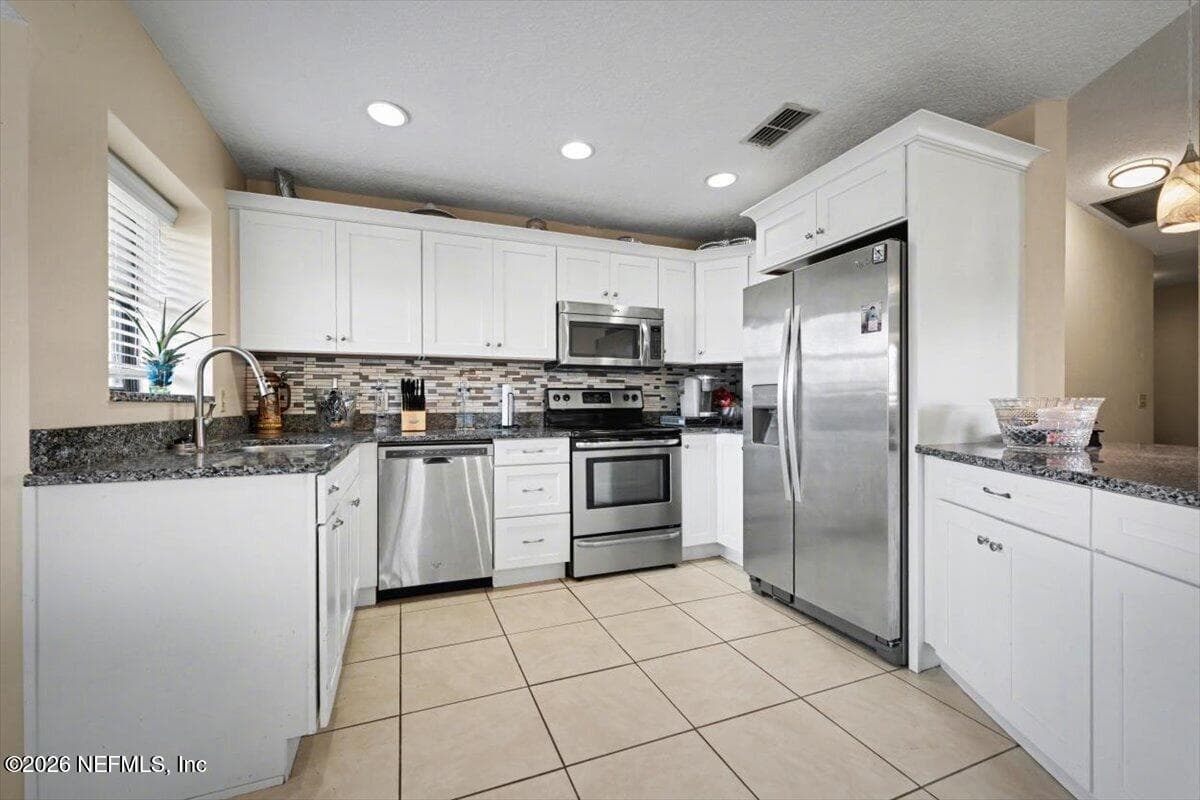 Photo 8 of 109 CORAL REEF Court N, Palm Coast, FL 32137