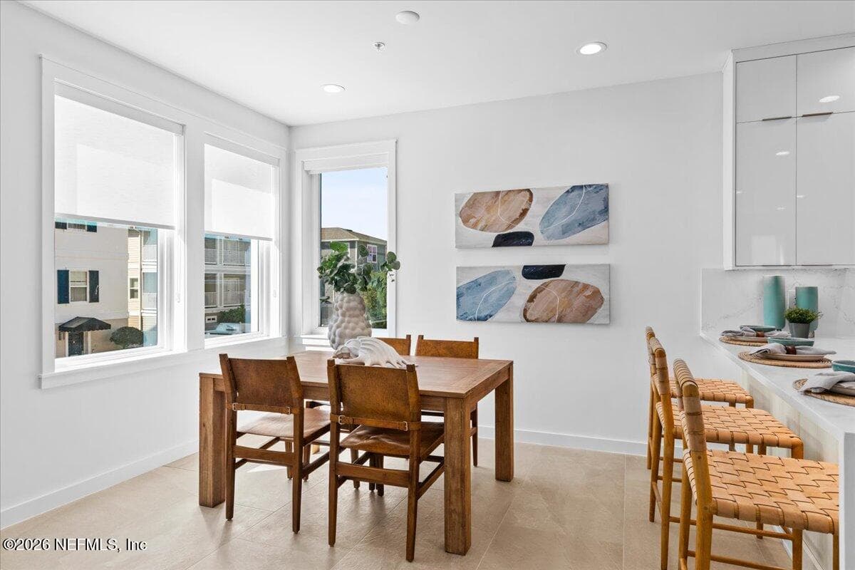 Dining Room with corner windows — 118 13TH Avenue S 103 C, Jacksonville Beach, FL 32250