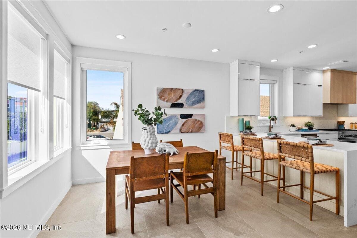 Dining Room and Kitchen Breakfast Bar — 118 13TH Avenue S 103 C, Jacksonville Beach, FL 32250
