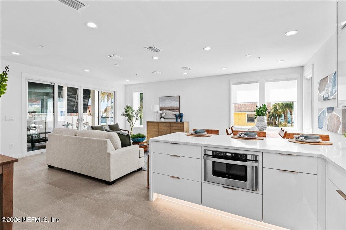 Kitchen with Microwave Draw — 118 13TH Avenue S 103 C, Jacksonville Beach, FL 32250