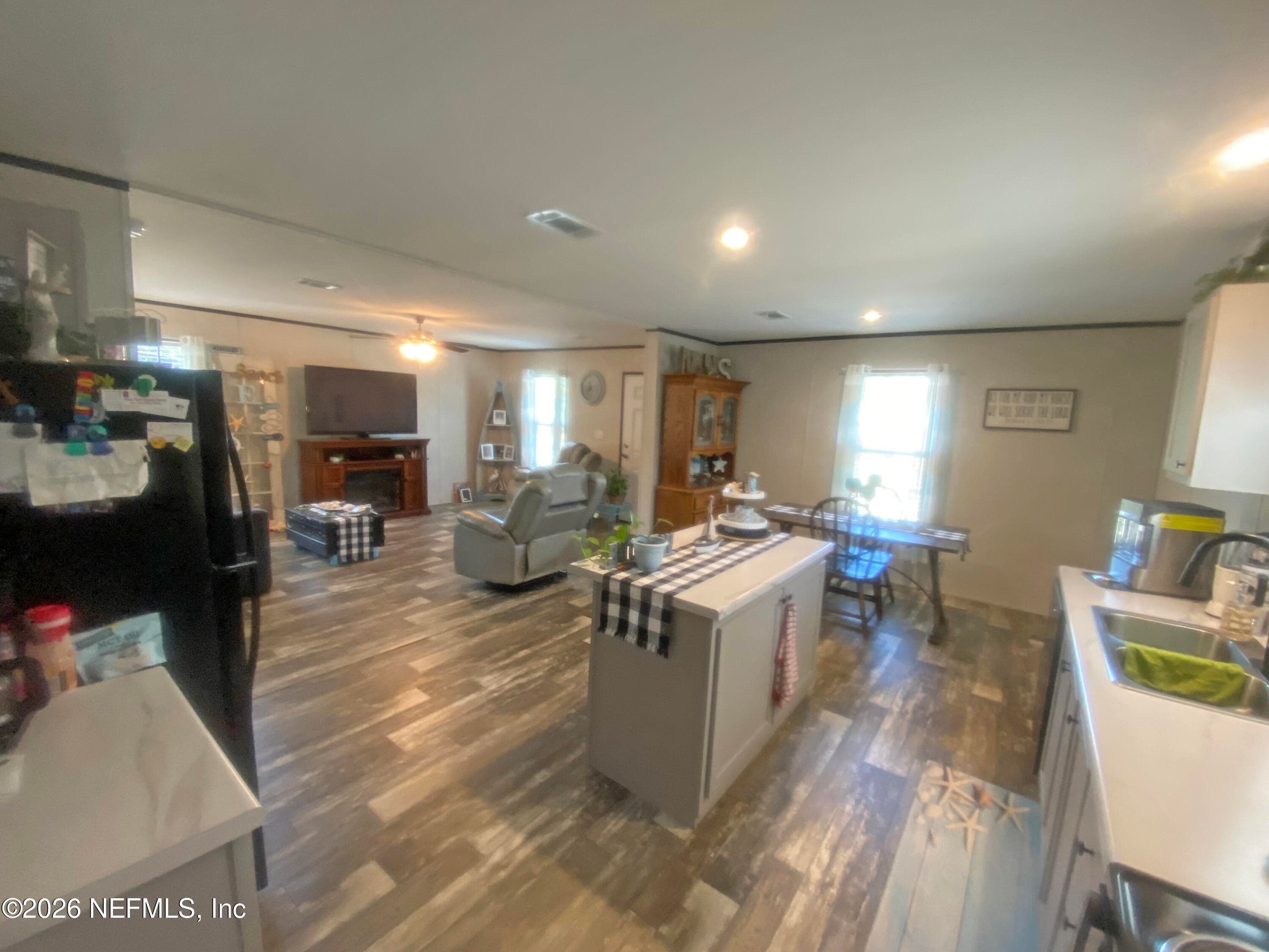 Kitchen, Dining Room and Living Room all open to each other — 203 SW 5TH Avenue, Palatka, FL 32177